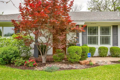 a view of a house with a garden