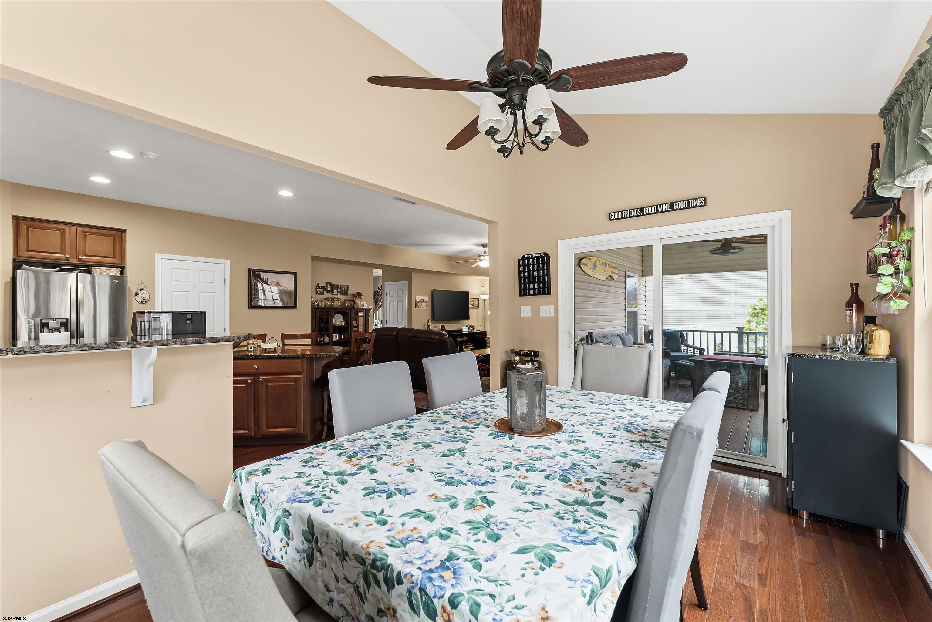 32 Renaissance Drive Mays Landing, NJ 08330 - Photo 14 of 50 a dining room with wooden floor and a chandelier