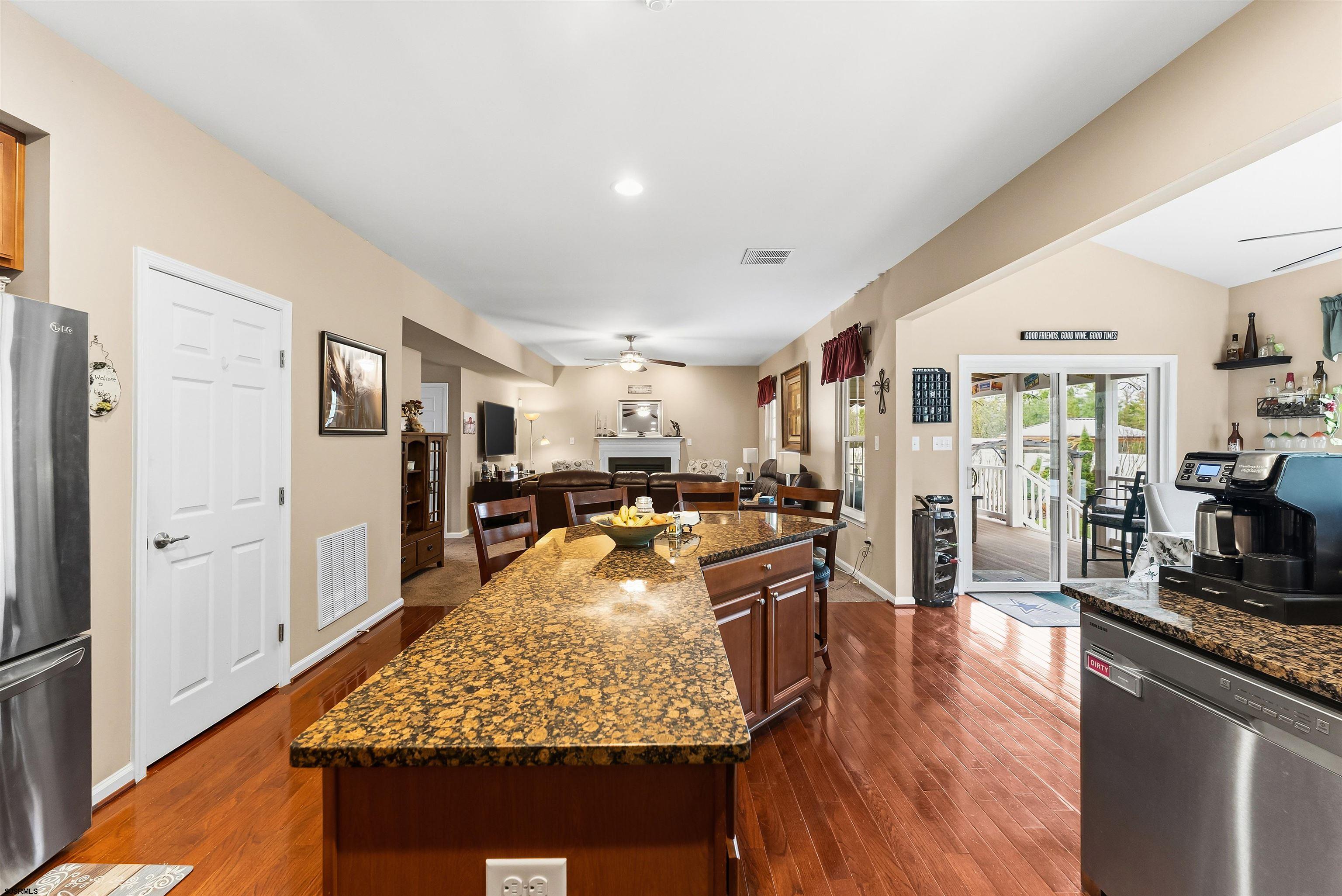 32 Renaissance Drive Mays Landing, NJ 08330 - Photo 15 of 50 a living room with stainless steel appliances granite countertop furniture wooden floor and a counter top space