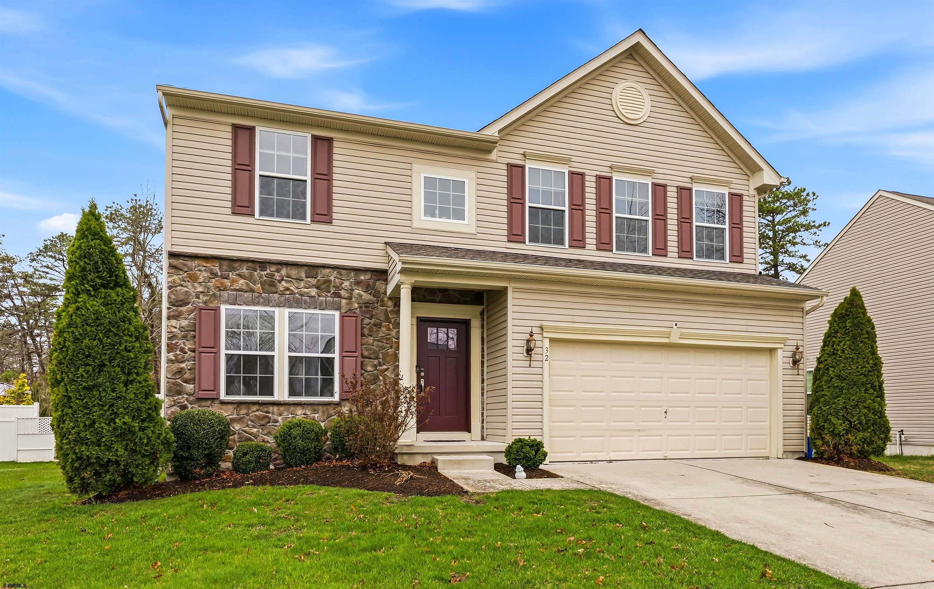 32 Renaissance Drive Mays Landing, NJ 08330 - Photo 2 of 50 a front view of a house with garden