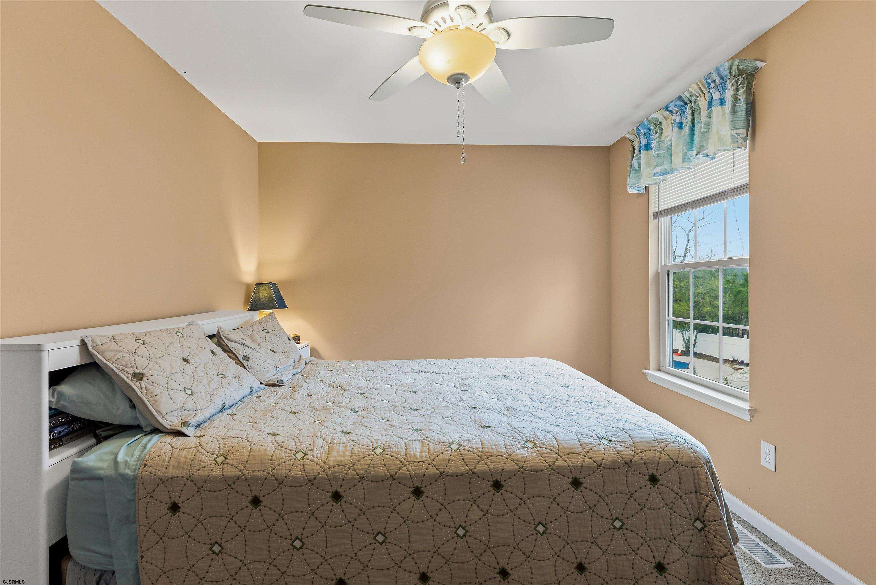 32 Renaissance Drive Mays Landing, NJ 08330 - Photo 22 of 50 a bedroom with a bed and a window