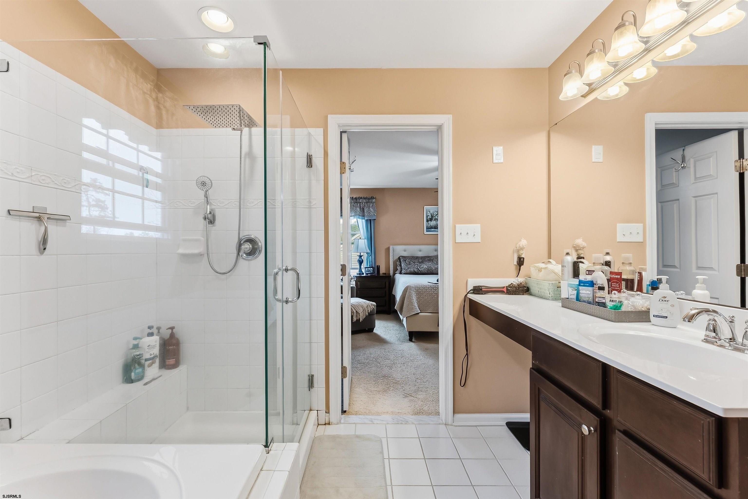 32 Renaissance Drive Mays Landing, NJ 08330 - Photo 29 of 50 a bathroom with a sink double vanity and a shower