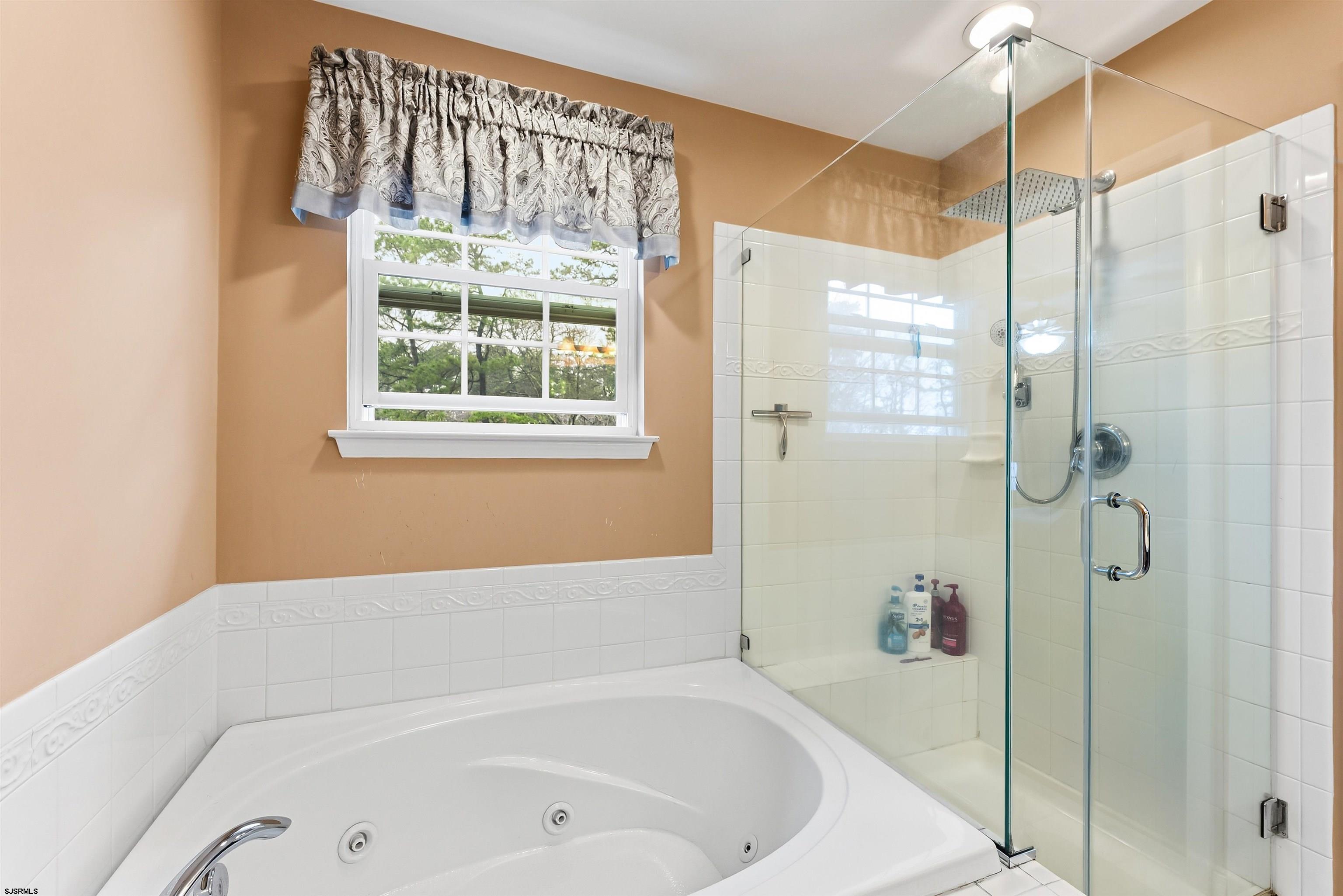 32 Renaissance Drive Mays Landing, NJ 08330 - Photo 30 of 50 a bathroom with a bathtub and a shower
