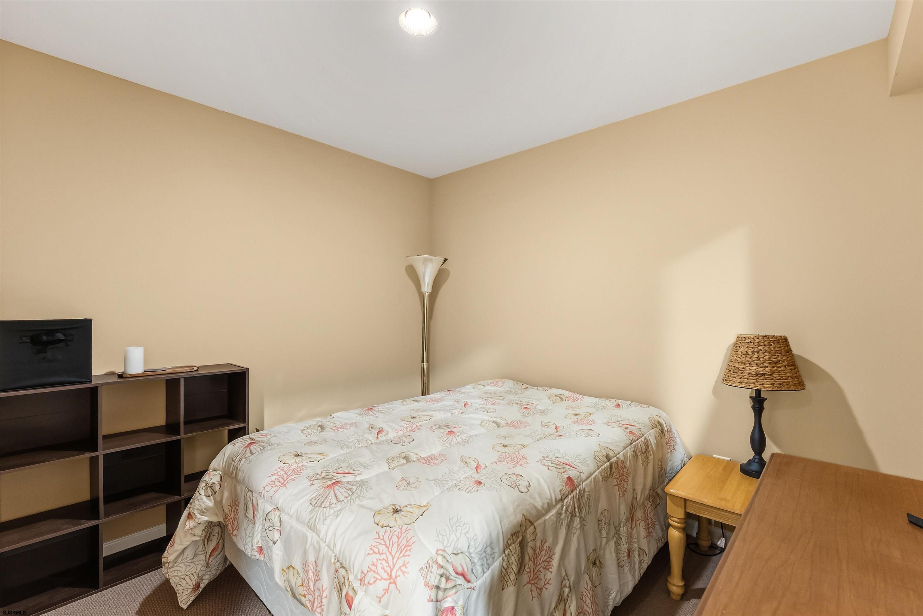 32 Renaissance Drive Mays Landing, NJ 08330 - Photo 37 of 50 a bedroom with a bed and a lamp