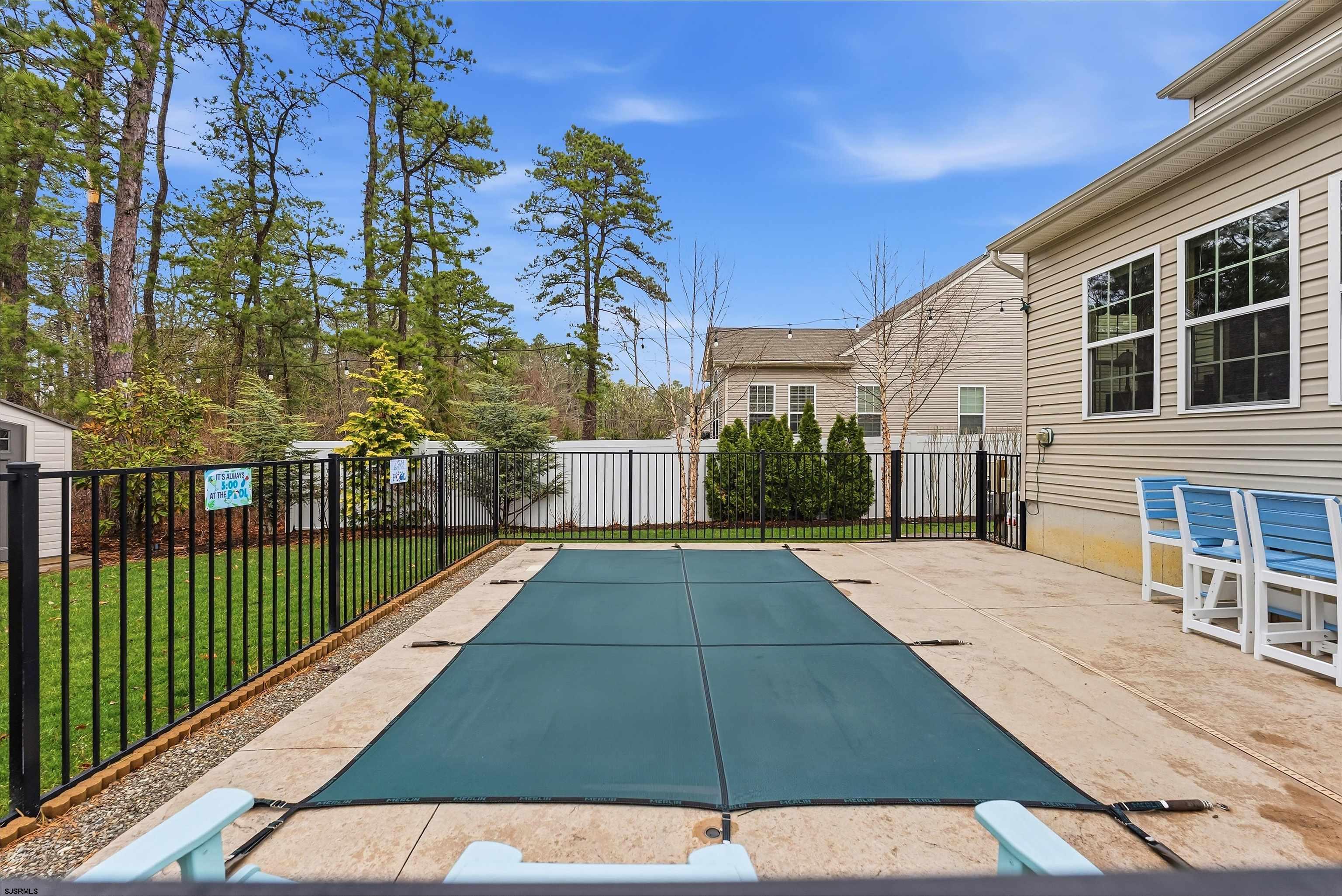 32 Renaissance Drive Mays Landing, NJ 08330 - Photo 42 of 50 a view of a patio with a table and chairs