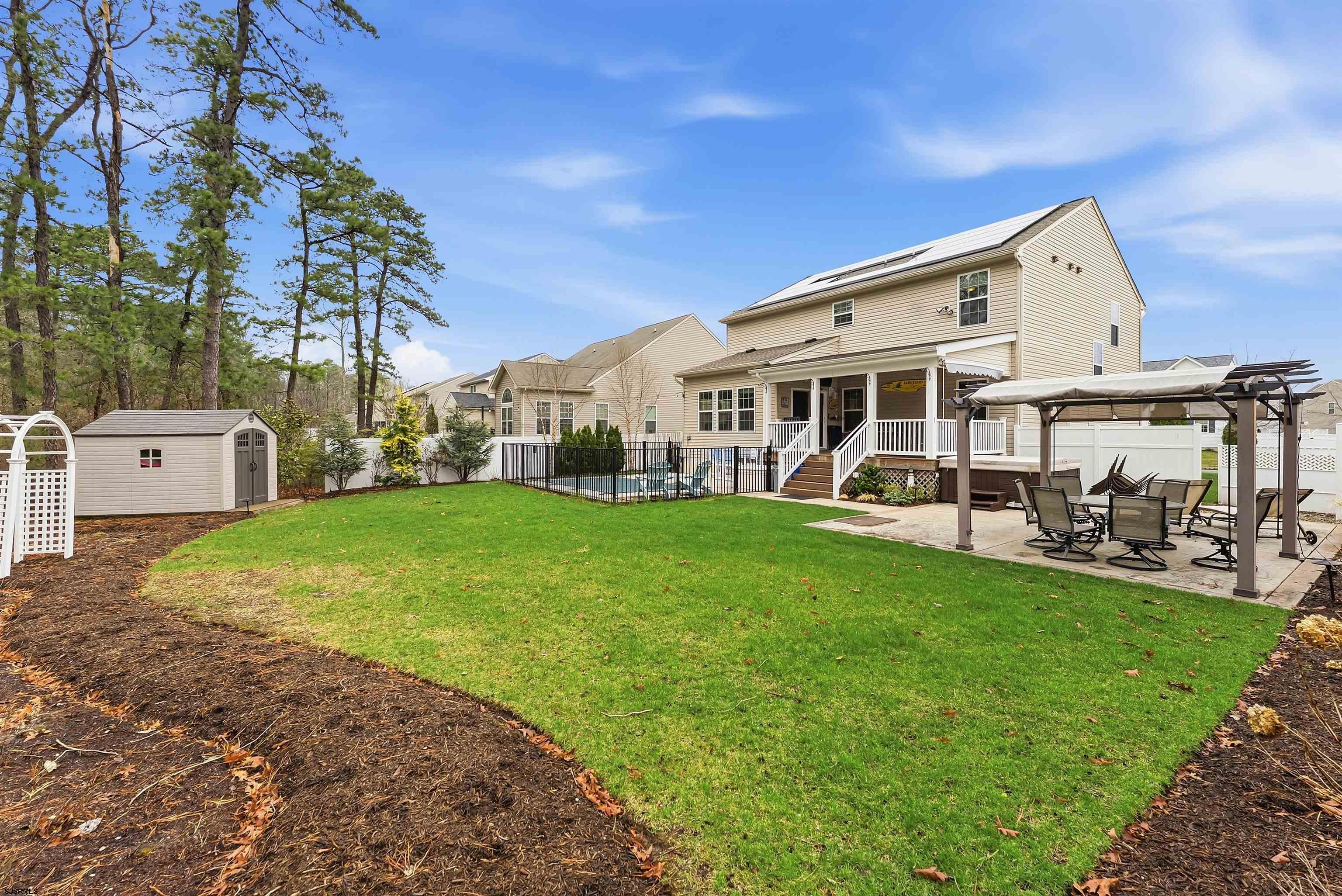 32 Renaissance Drive Mays Landing, NJ 08330 - Photo 47 of 50 a view of a house with a backyard porch and sitting area