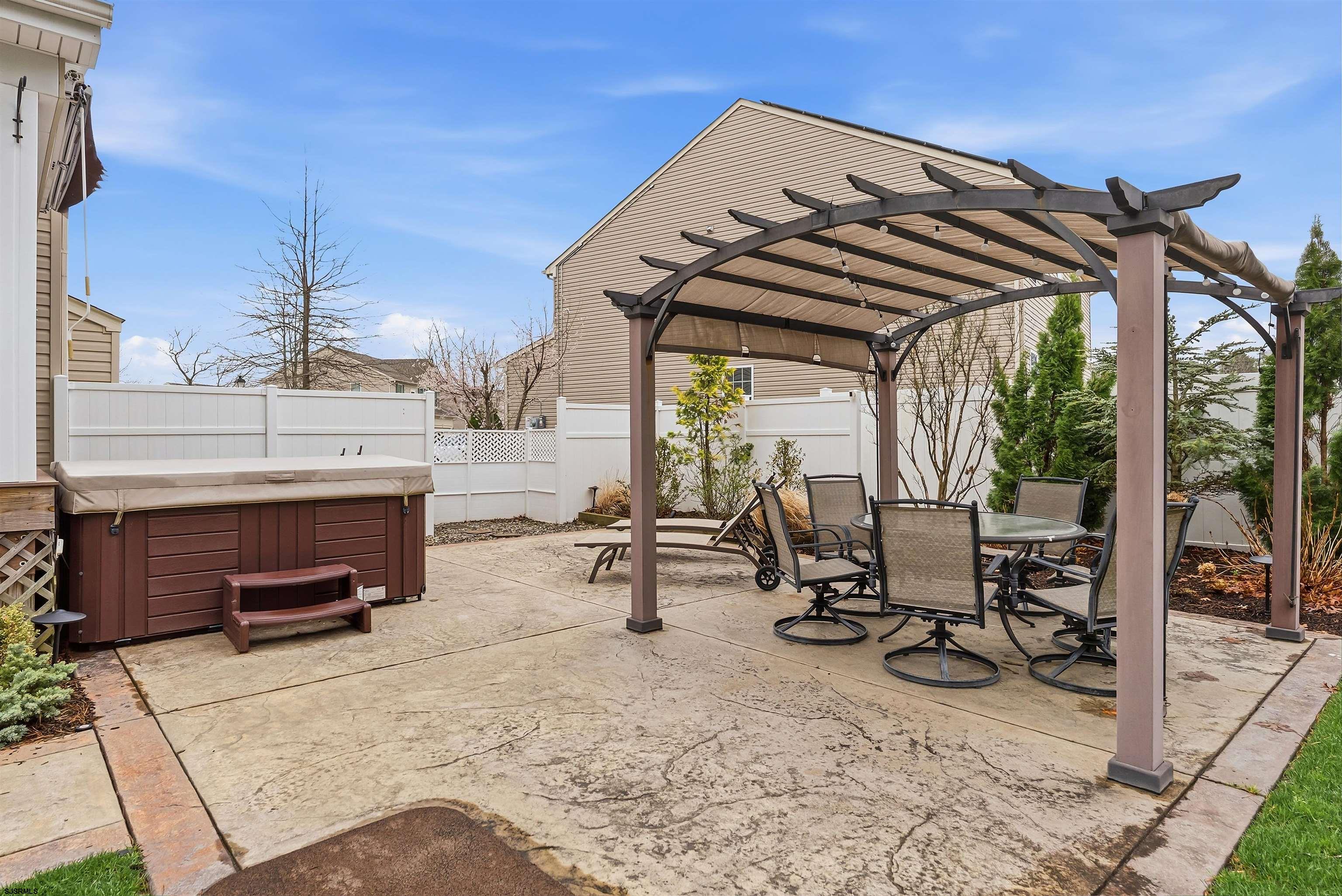 32 Renaissance Drive Mays Landing, NJ 08330 - Photo 48 of 50 a view of a patio with a table and chairs and a barbeque