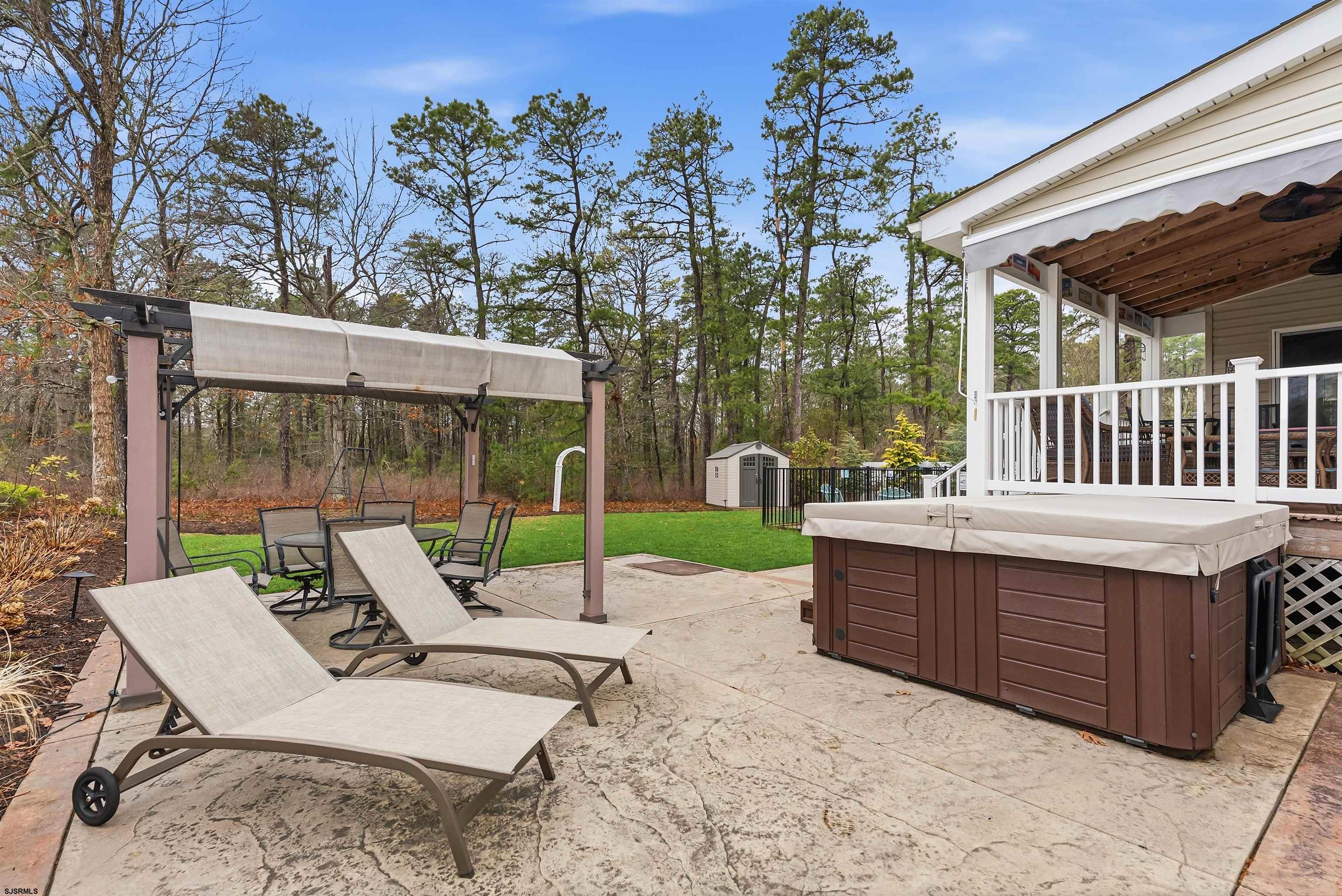 32 Renaissance Drive Mays Landing, NJ 08330 - Photo 49 of 50 a view of a patio with a table chairs and a backyard