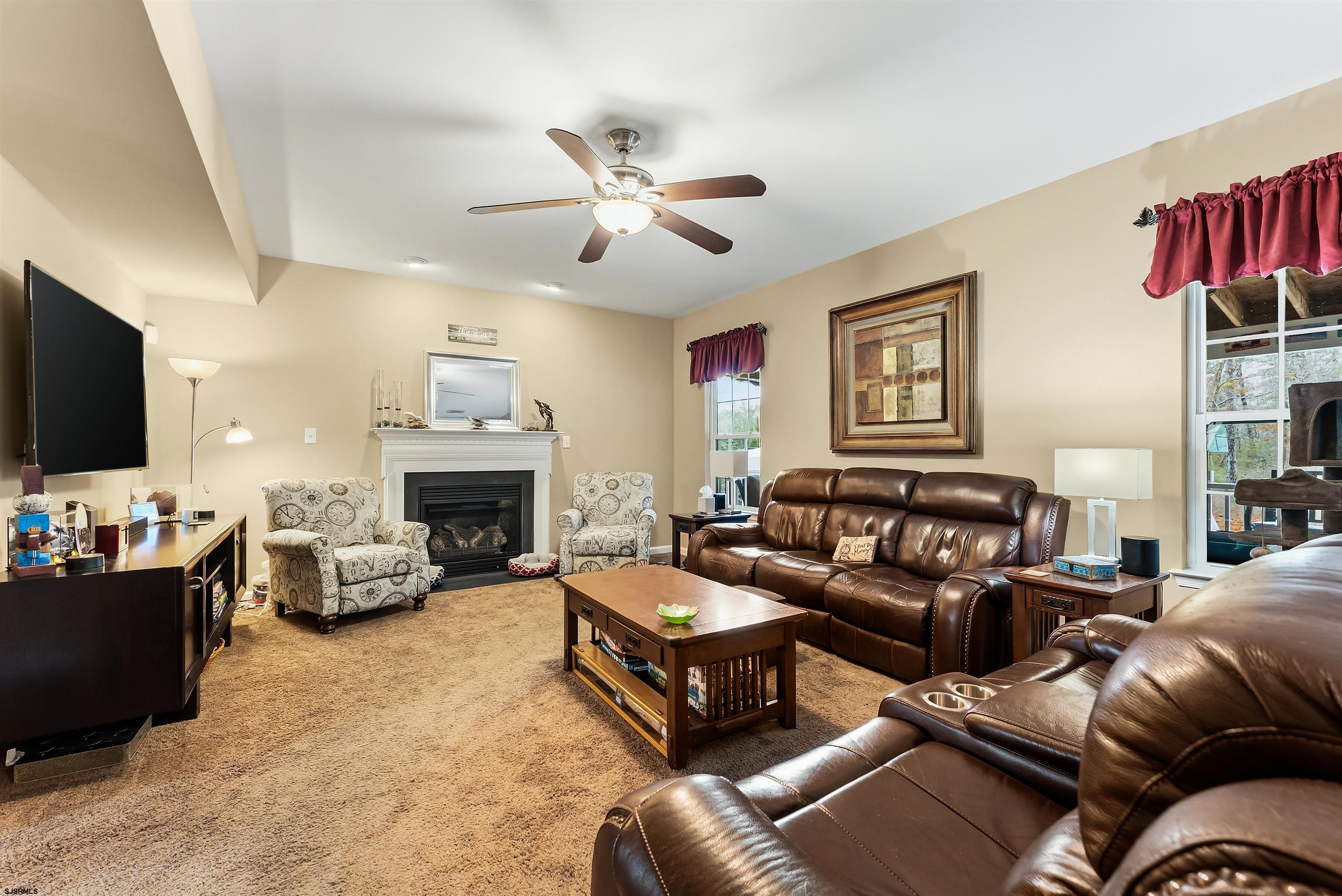 32 Renaissance Drive Mays Landing, NJ 08330 - Photo 6 of 50 a living room with furniture fireplace and flat screen tv