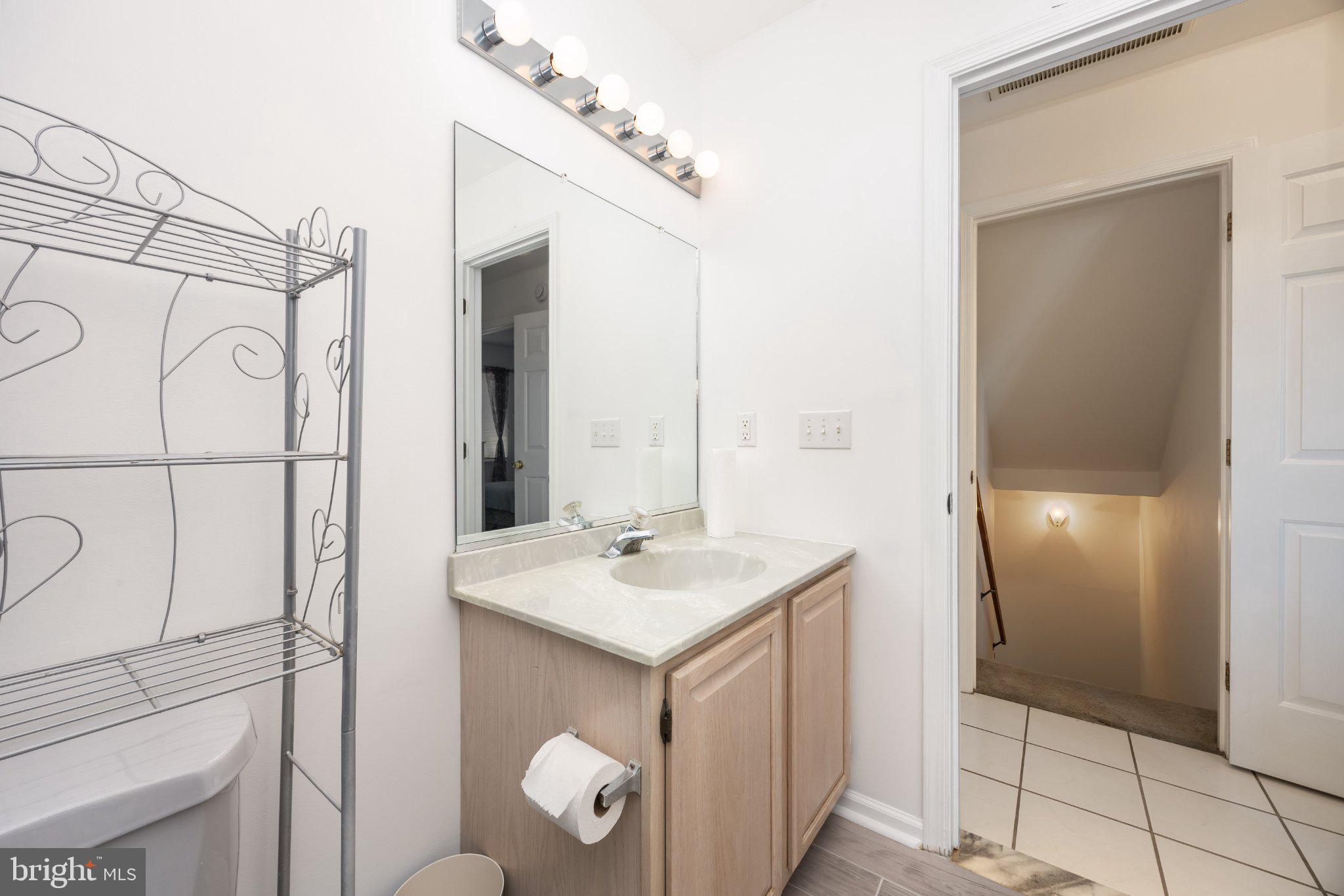 10431 Brighton Road Ocean City, MD 21842 - Photo 11 of 39 Bright and airy bathroom retreat.