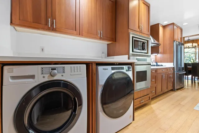 a utility room with dryer and washer