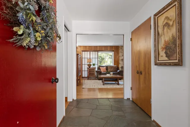 a view of utility room and living room