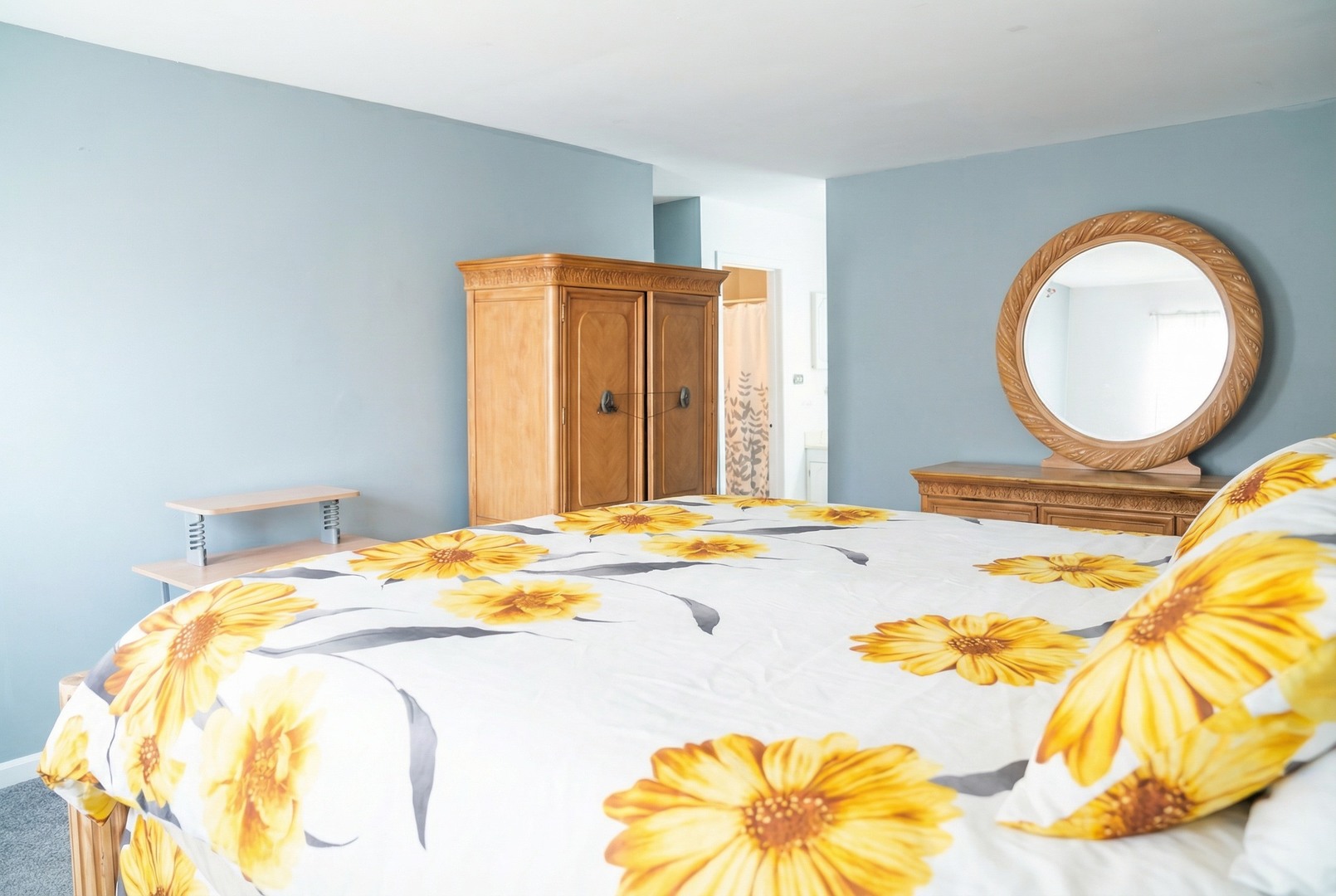 34 Wedgewood Road Matteson, IL 60443 - Photo 11 of 15 a bedroom with a bed and a chandelier