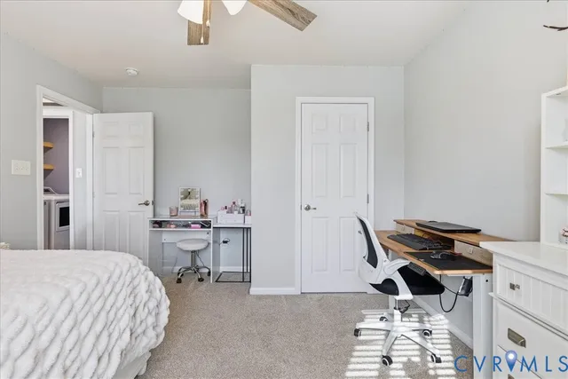 a view of deck with furniture and barbeque oven with wooden fence