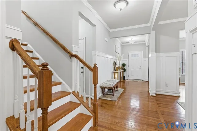 a view of a livingroom with furniture and wooden floor