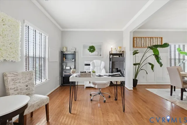 a workspace with furniture and wooden floor