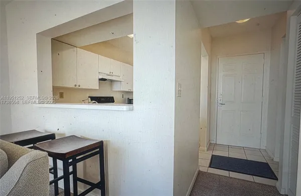a room with a table and chairs