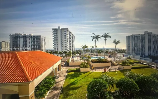 a view of a city with tall buildings