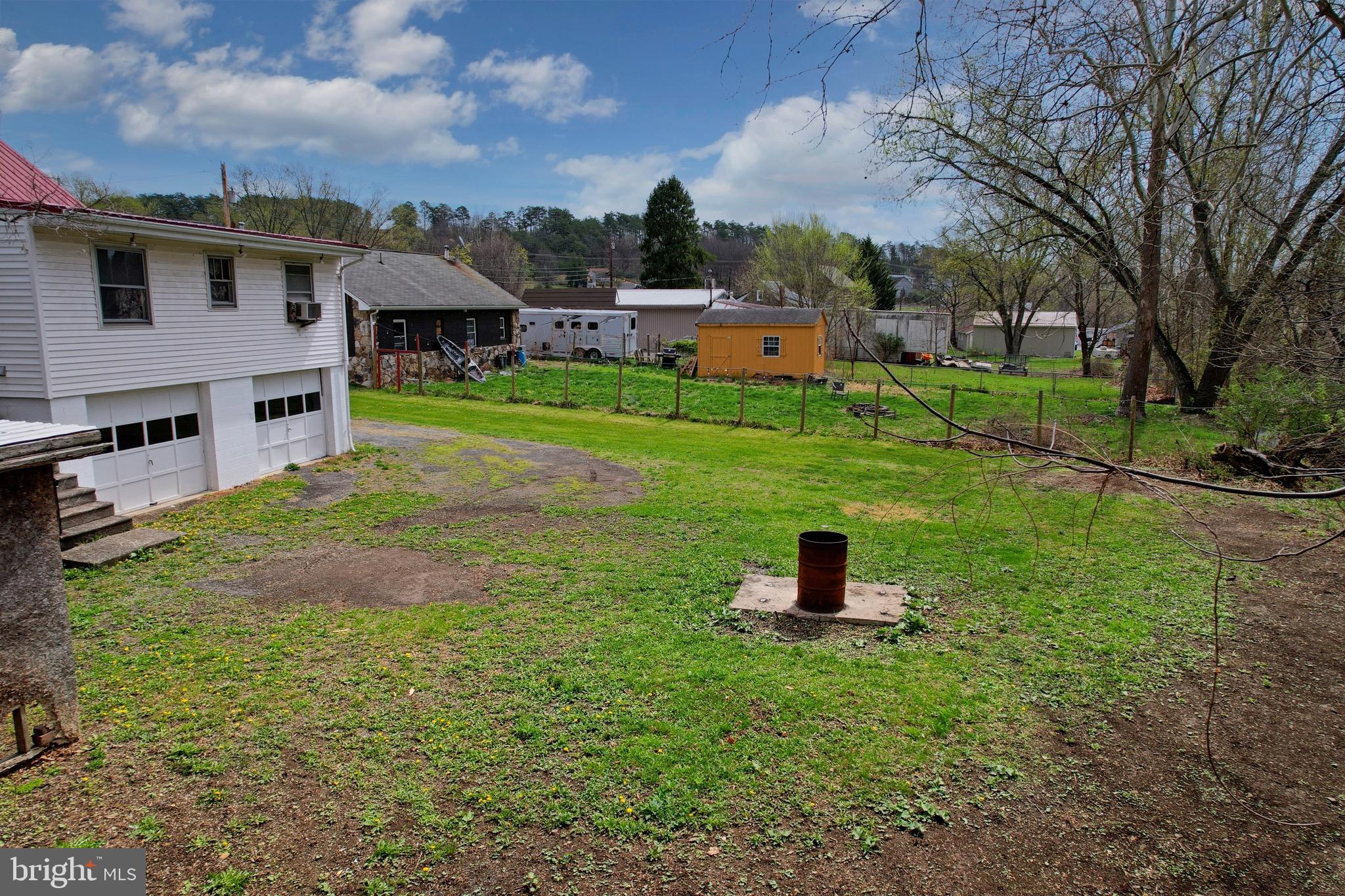 159 Rocket Center Road Keyser, WV 26726 - Photo 63 of 64 a front view of a house with a yard