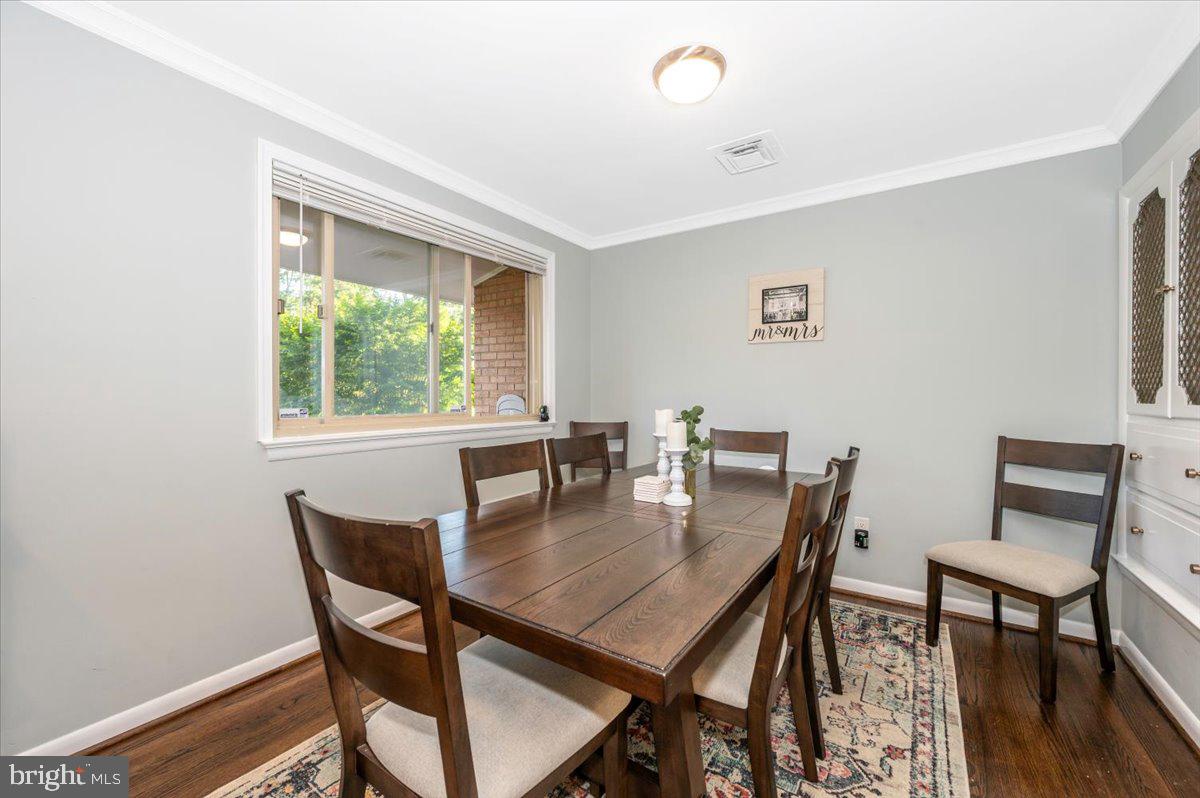 2208 Muskogee Street Adelphi, MD 20783 - Photo 17 of 71 a view of a dining room with furniture and wooden floor