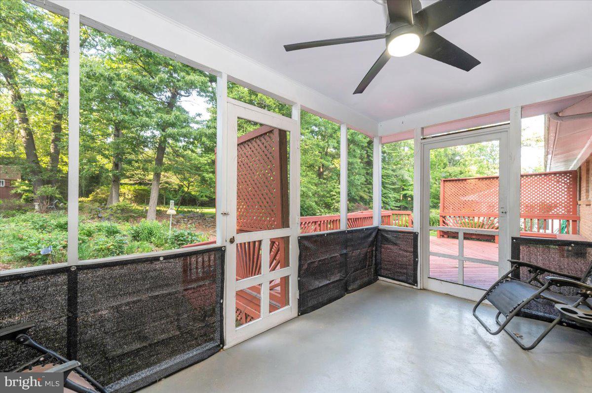 2208 Muskogee Street Adelphi, MD 20783 - Photo 29 of 71 a room with furniture and large windows