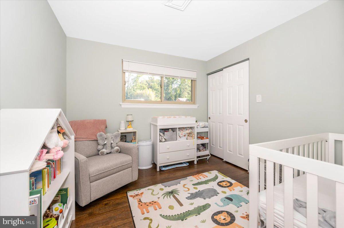 2208 Muskogee Street Adelphi, MD 20783 - Photo 38 of 71 a bedroom with furniture and a baby crib