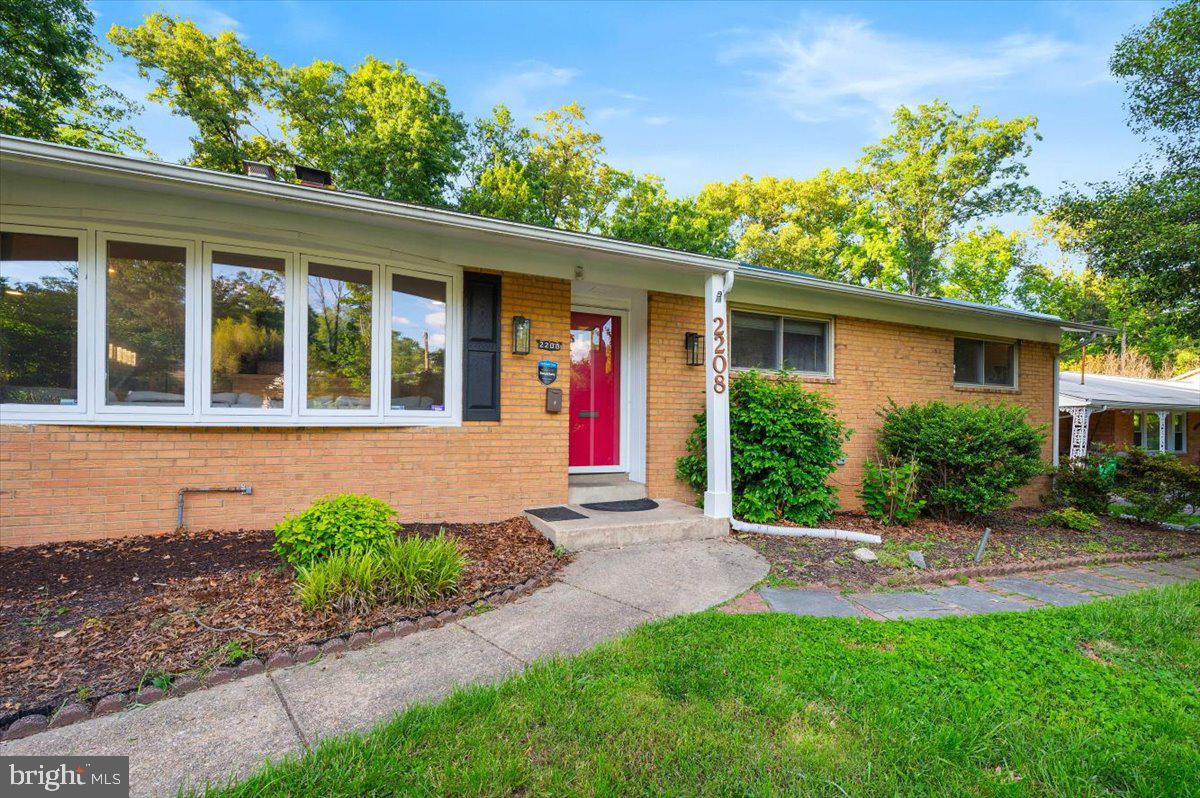 2208 Muskogee Street Adelphi, MD 20783 - Photo 5 of 71 front view of a house with a yard