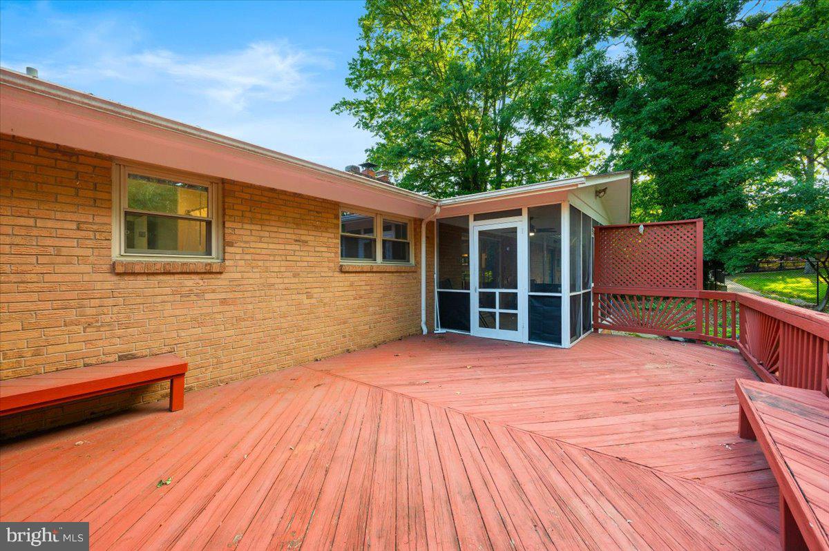 2208 Muskogee Street Adelphi, MD 20783 - Photo 60 of 71 a view of backyard with deck and outdoor seating