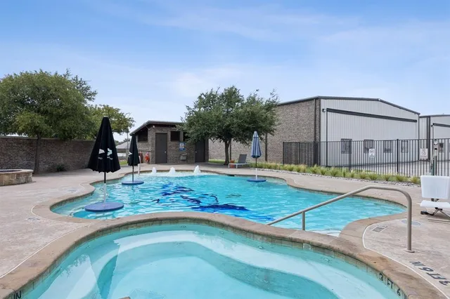 a house view with a swimming pool