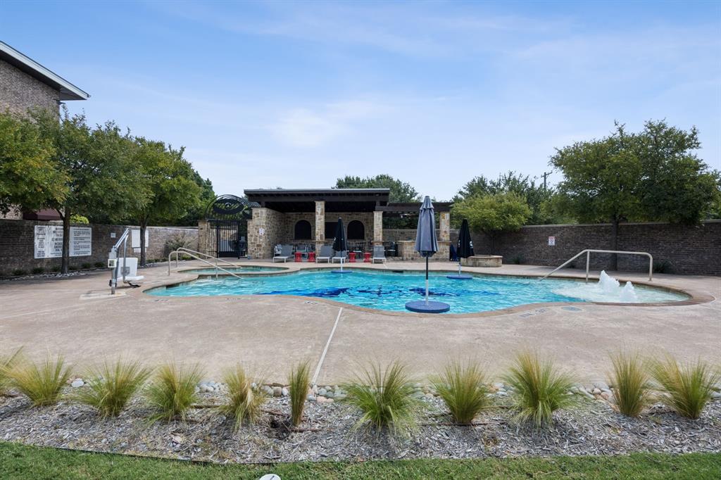 9400 Ragwing Lane McKinney, TX 75071 - Photo 8 of 30 a front view of a house with garden
