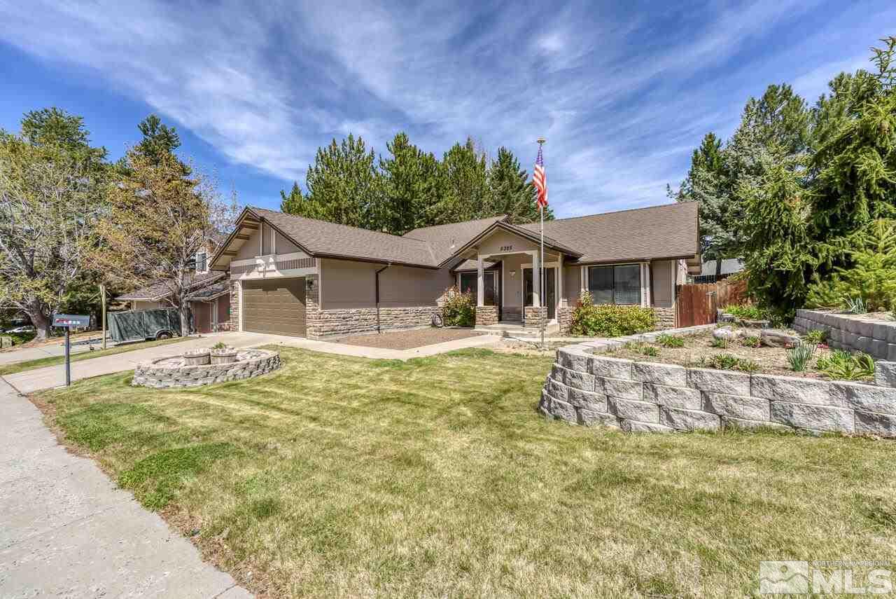 5325 Mountcrest Lane Reno, NV 89523 - Photo 1 of 17 a house with swimming pool in front of it
