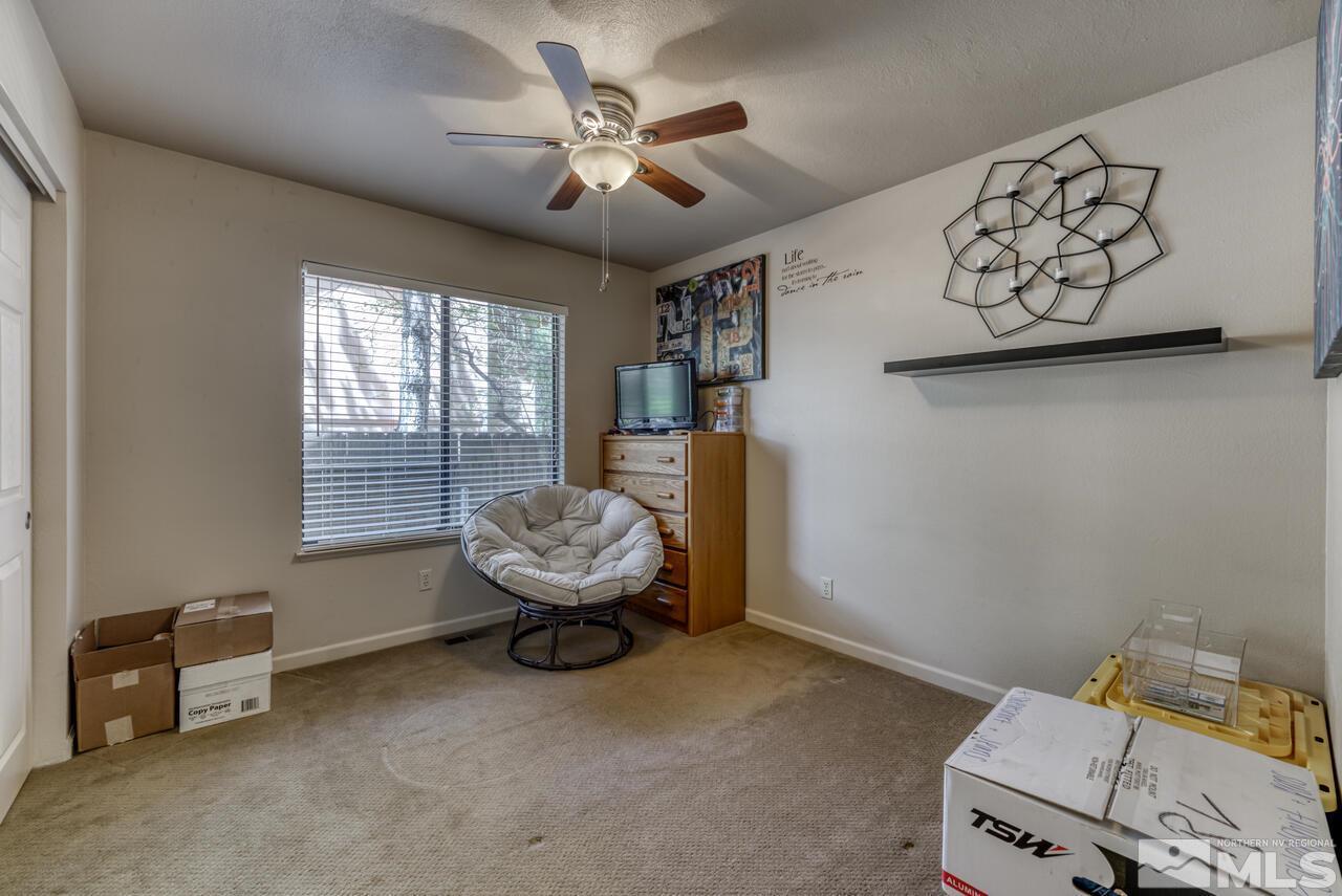 5325 Mountcrest Lane Reno, NV 89523 - Photo 11 of 17 a room with furniture and window