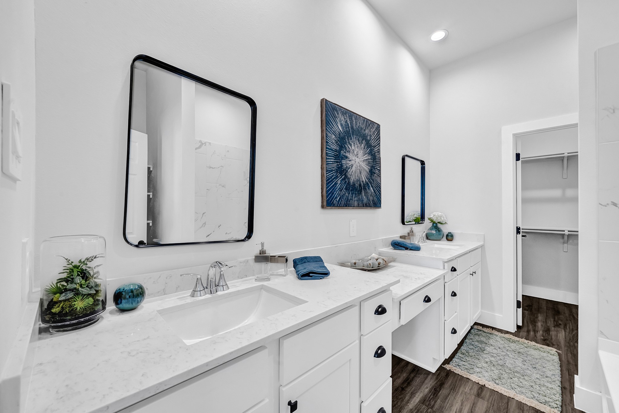38634 Spur 149 Road, Unit 4A Magnolia, TX 77354 - Photo 13 of 50 a bathroom with double vanity sinks and a mirror