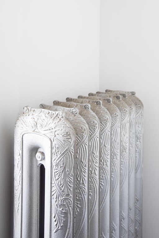 12 Farwell Place, Unit 12 Cambridge, MA 02138 - Photo 14 of 17 a view of a bedroom with a bed and a chandelier