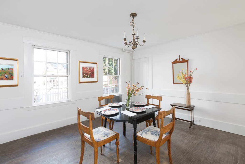 12 Farwell Place, Unit 12 Cambridge, MA 02138 - Photo 3 of 17 a view of a dining room with furniture and chandelier