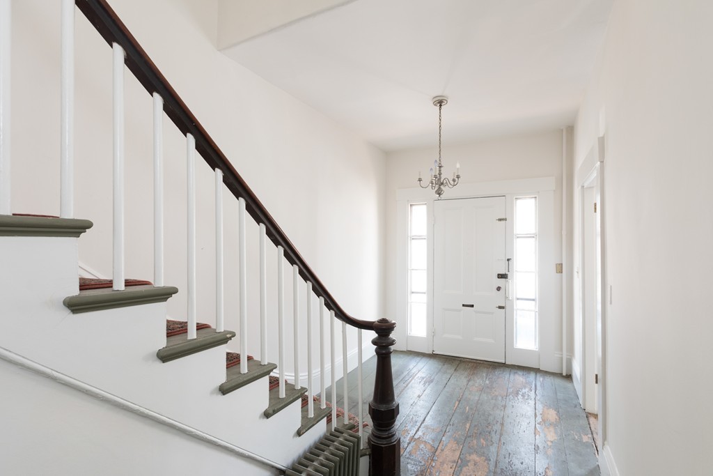 12 Farwell Place, Unit 12 Cambridge, MA 02138 - Photo 10 of 17 a view of entryway and hall with wooden floor