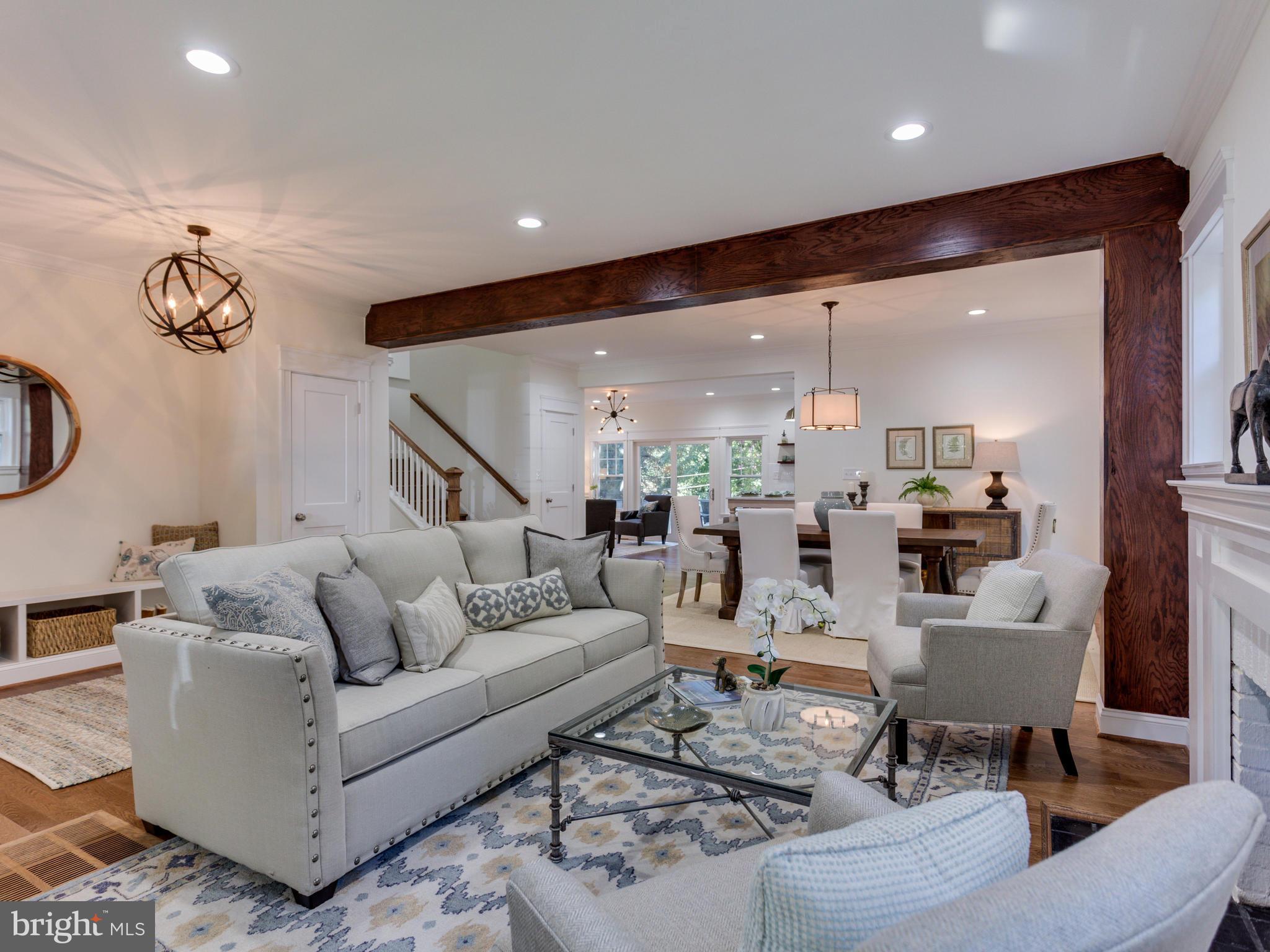 3722 Chesapeake Street Northwest Washington, DC 20016 - Photo 2 of 30 a living room with furniture and a view of kitchen