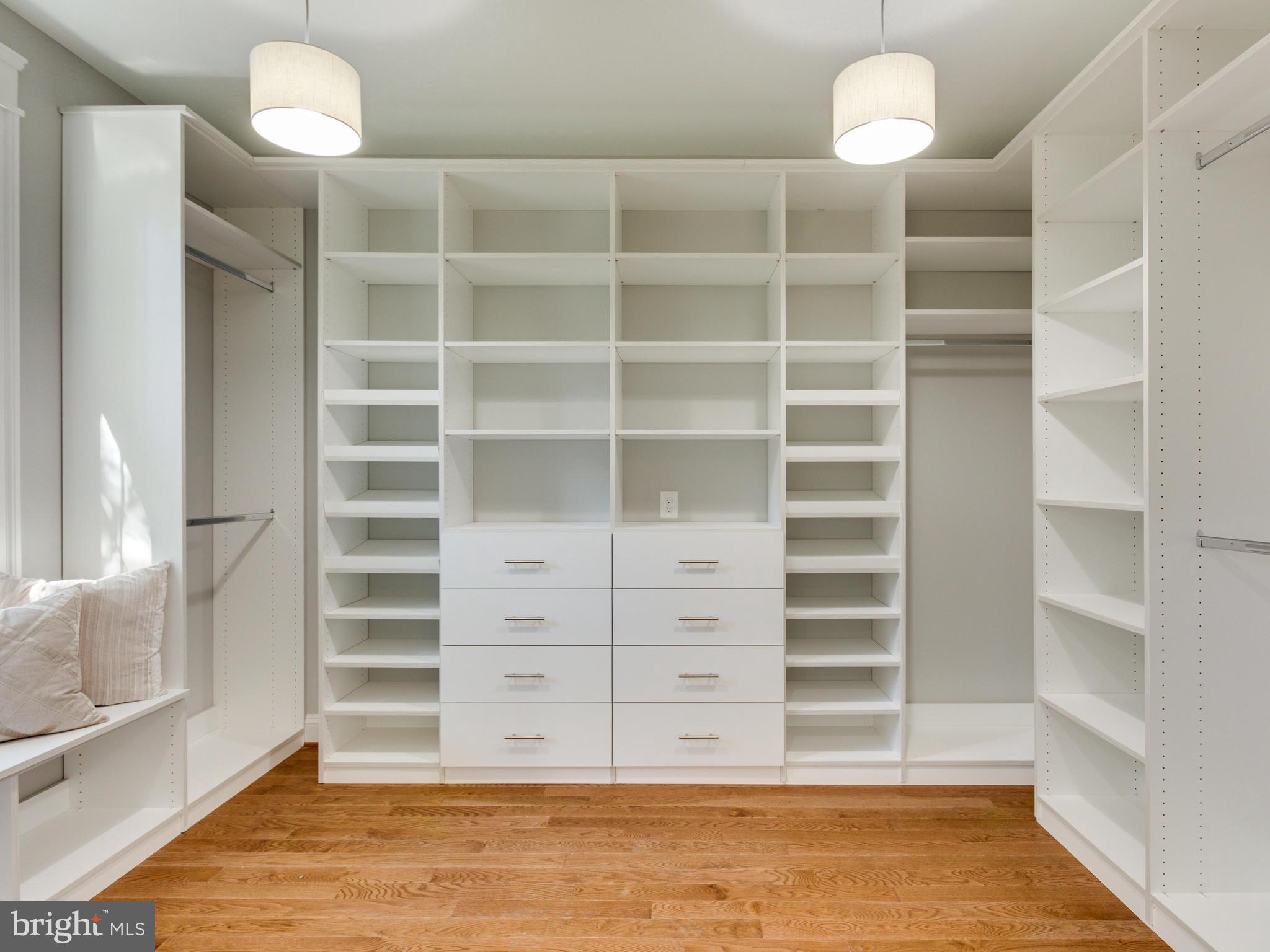 3722 Chesapeake Street Northwest Washington, DC 20016 - Photo 14 of 30 a view of walk in closet with empty racks