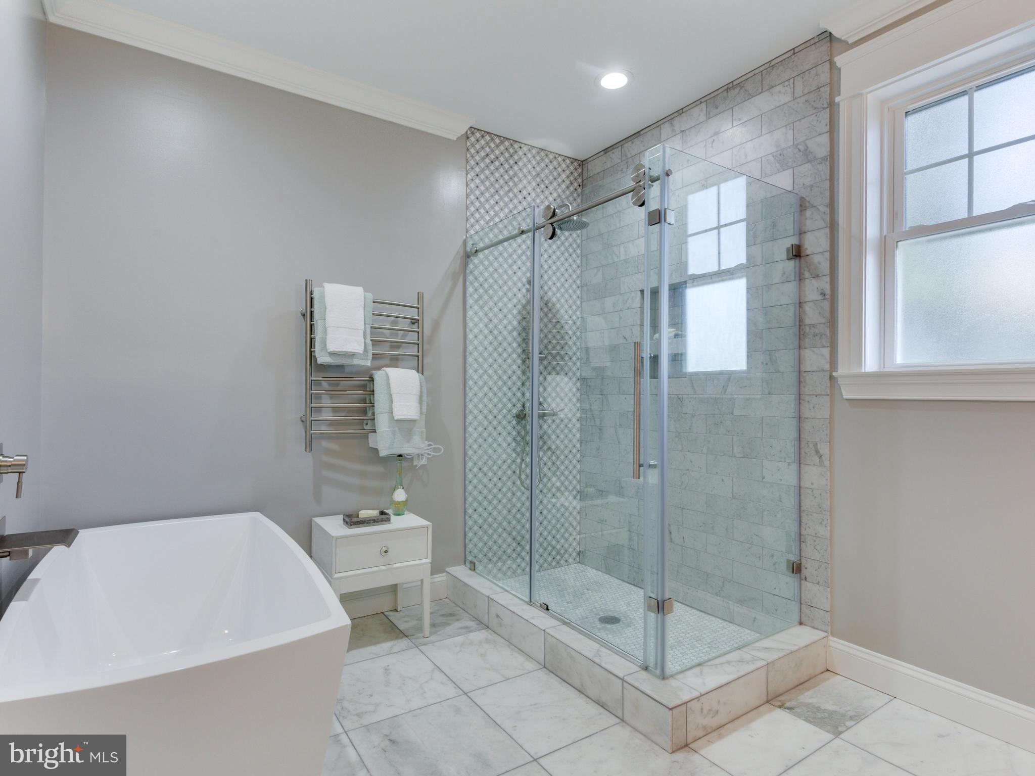 3722 Chesapeake Street Northwest Washington, DC 20016 - Photo 15 of 30 a bathroom with a shower a toilet and sink