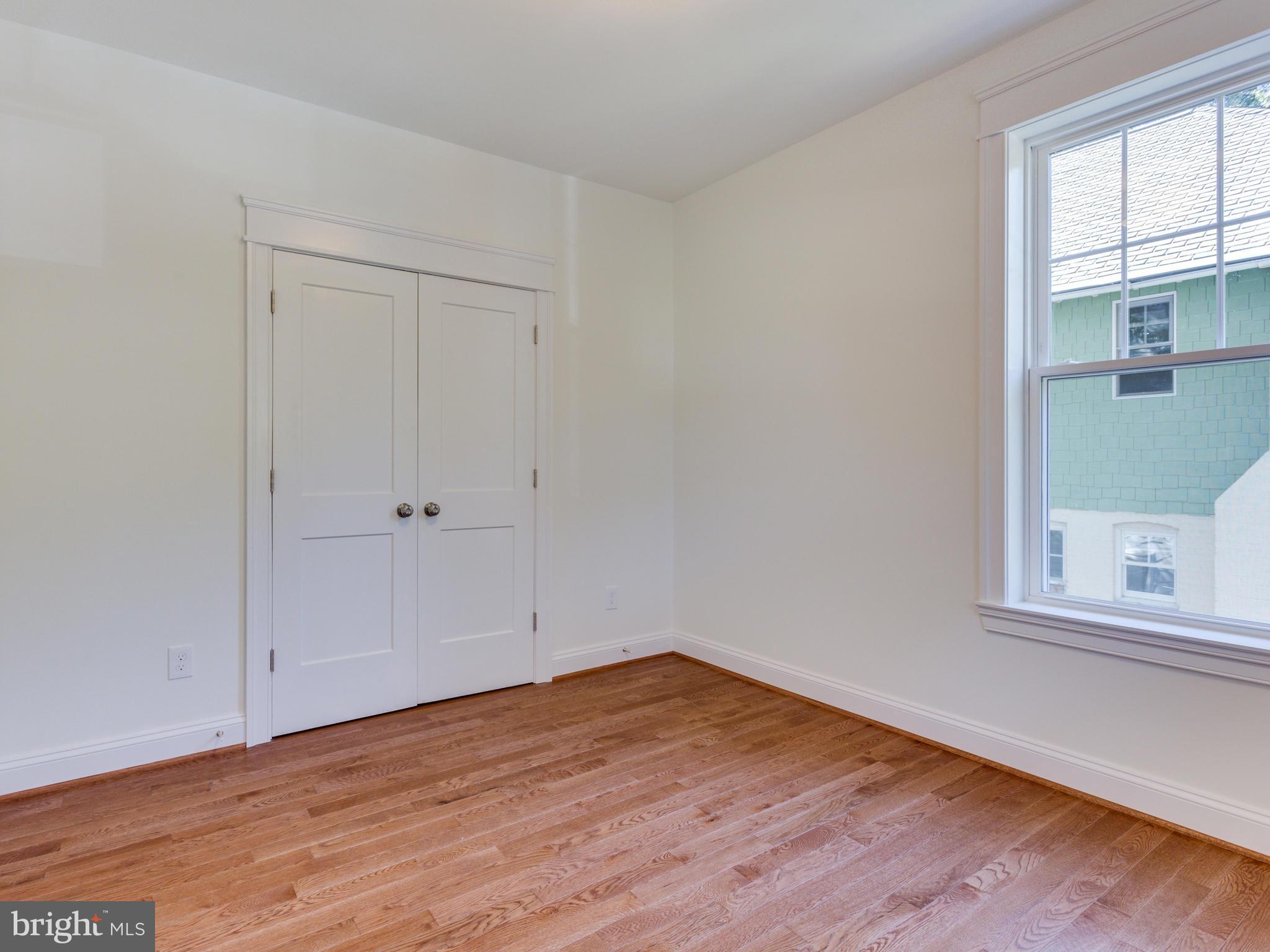 3722 Chesapeake Street Northwest Washington, DC 20016 - Photo 17 of 30 wooden floor in an empty room