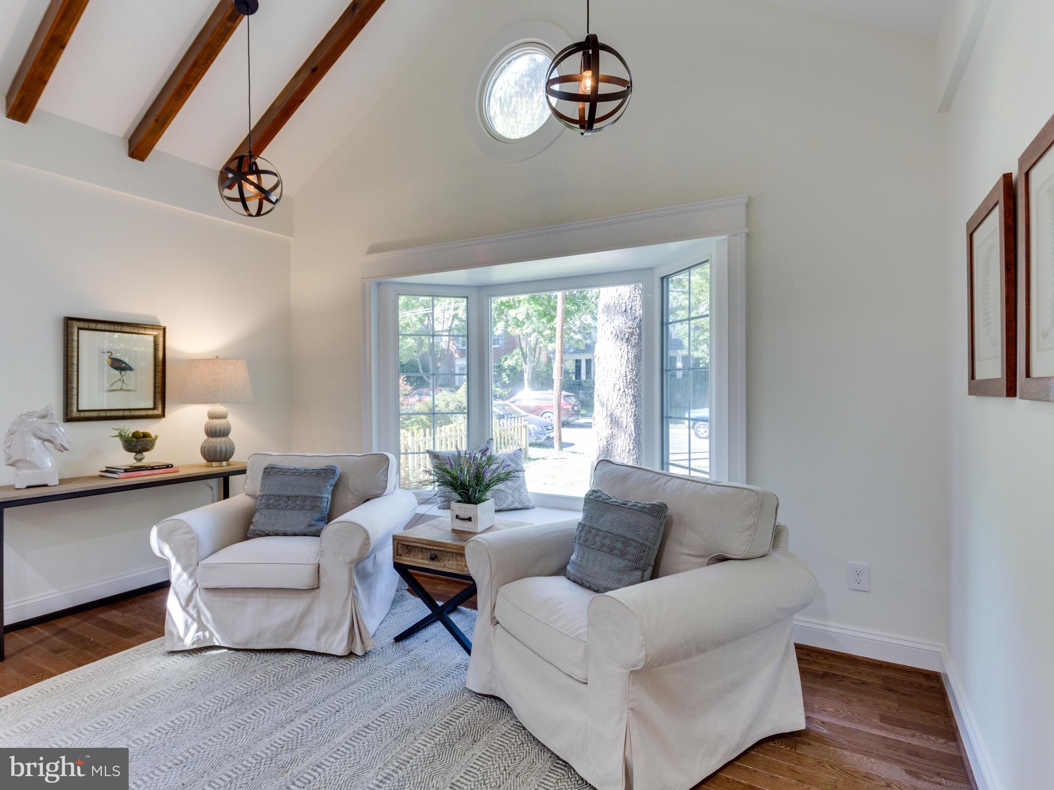 3722 Chesapeake Street Northwest Washington, DC 20016 - Photo 3 of 30 a living room with furniture and a large window