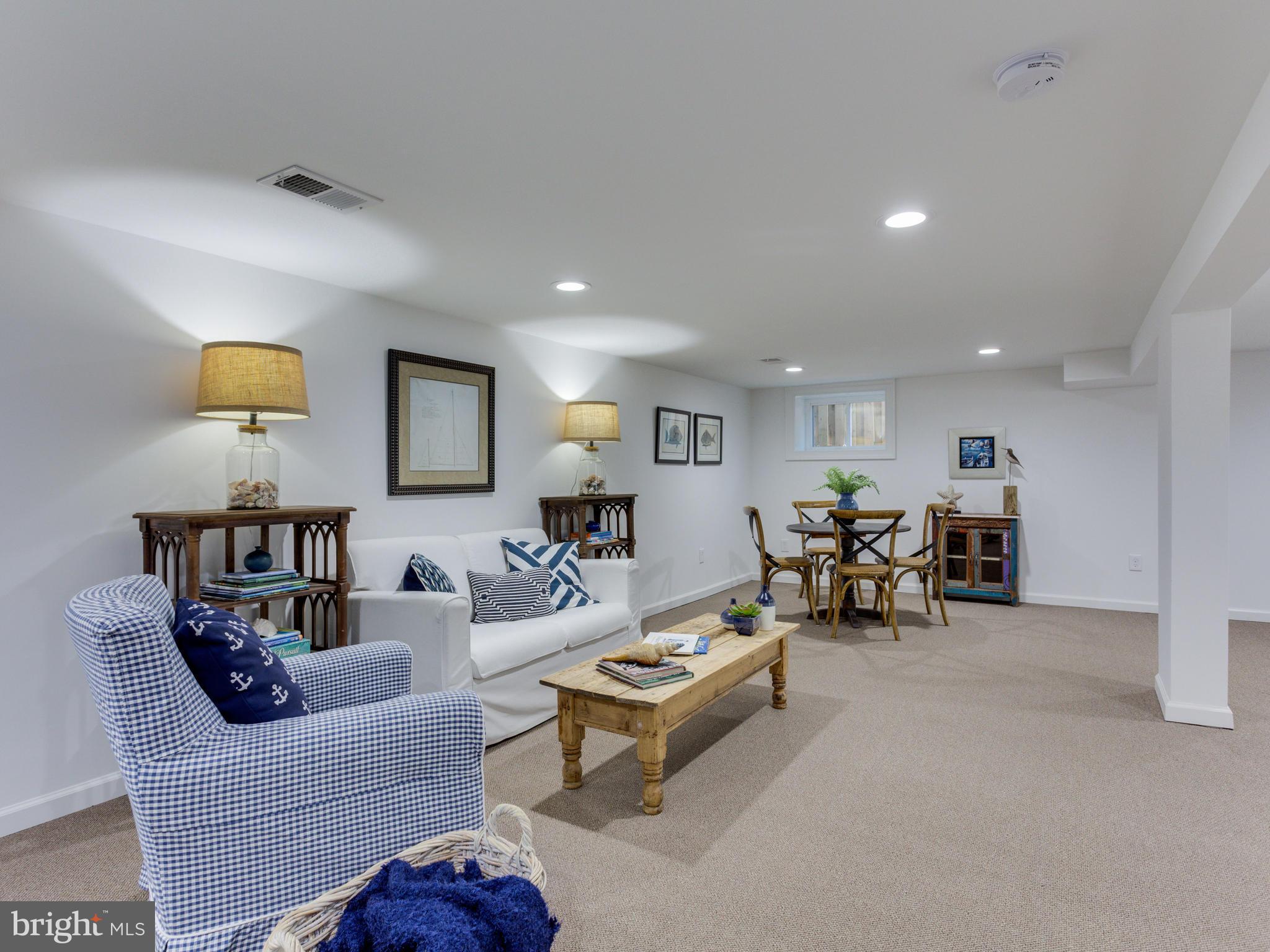 3722 Chesapeake Street Northwest Washington, DC 20016 - Photo 22 of 30 a living room with furniture and a table