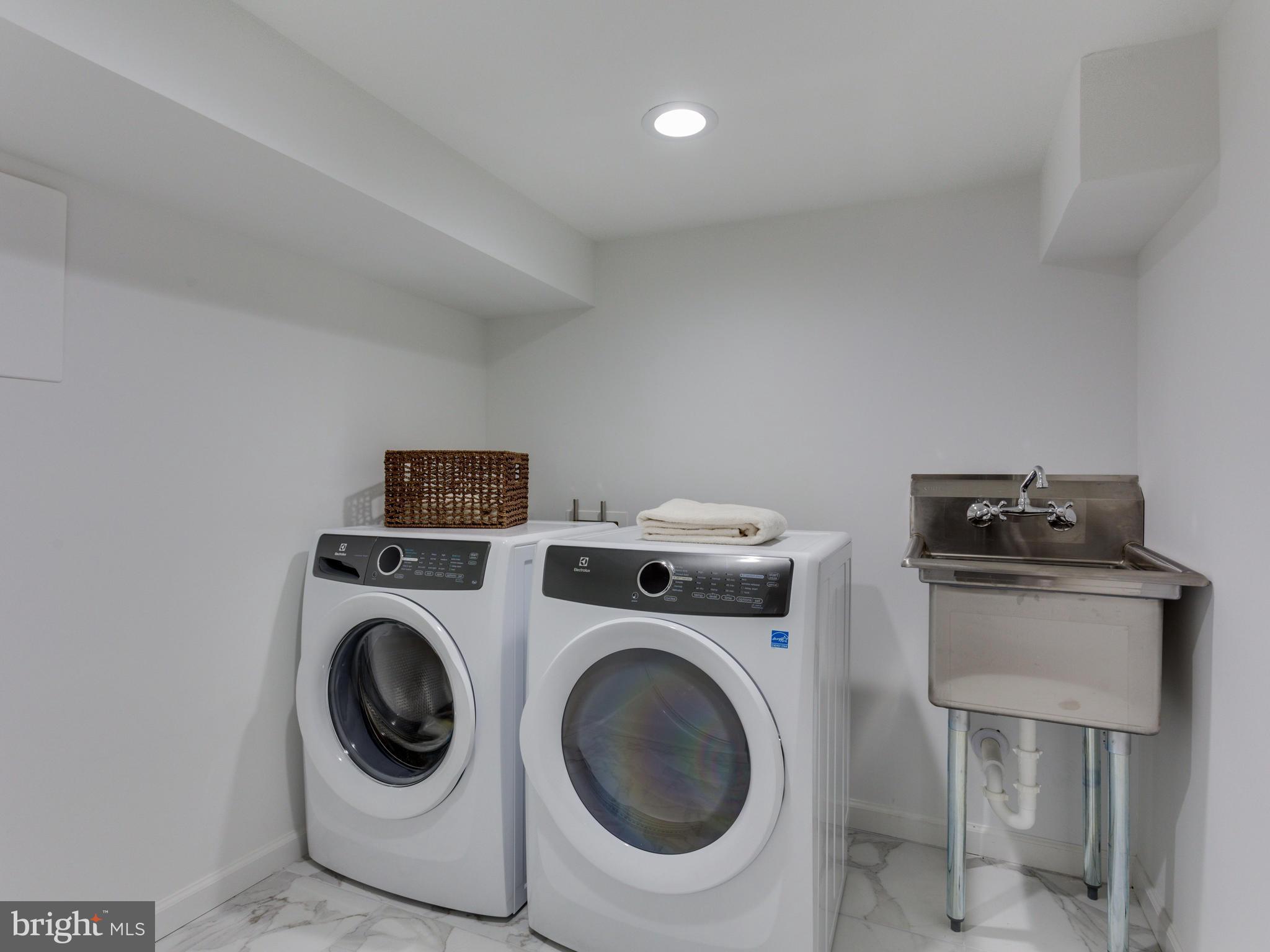3722 Chesapeake Street Northwest Washington, DC 20016 - Photo 23 of 30 a utility room with dryer and washer