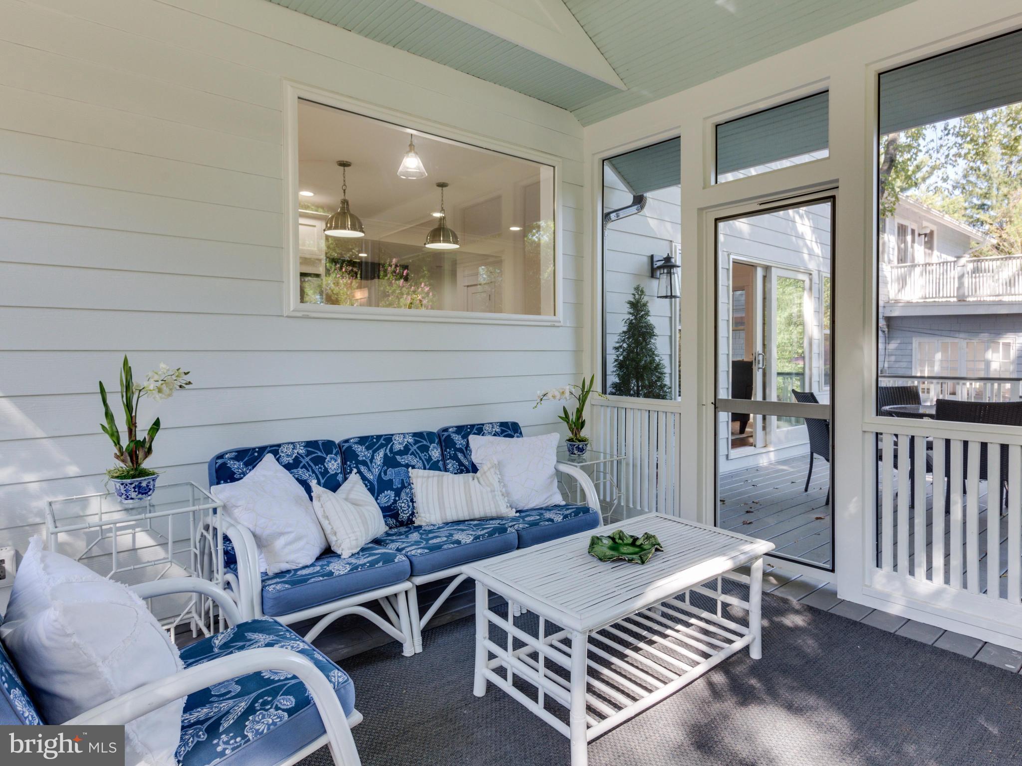 3722 Chesapeake Street Northwest Washington, DC 20016 - Photo 24 of 30 a living room with furniture and a potted plant