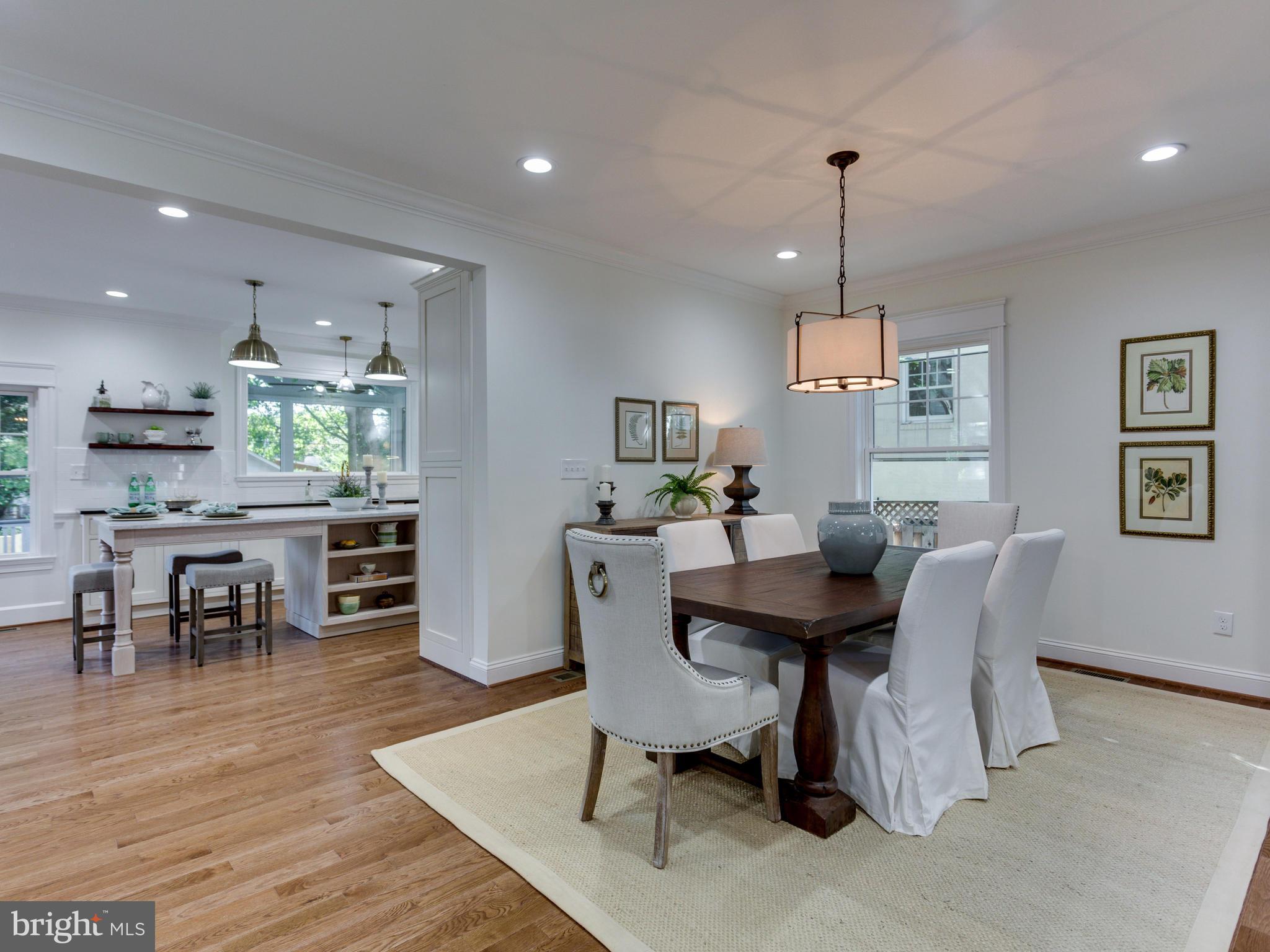3722 Chesapeake Street Northwest Washington, DC 20016 - Photo 5 of 30 a view of a dining room with furniture window and wooden floor