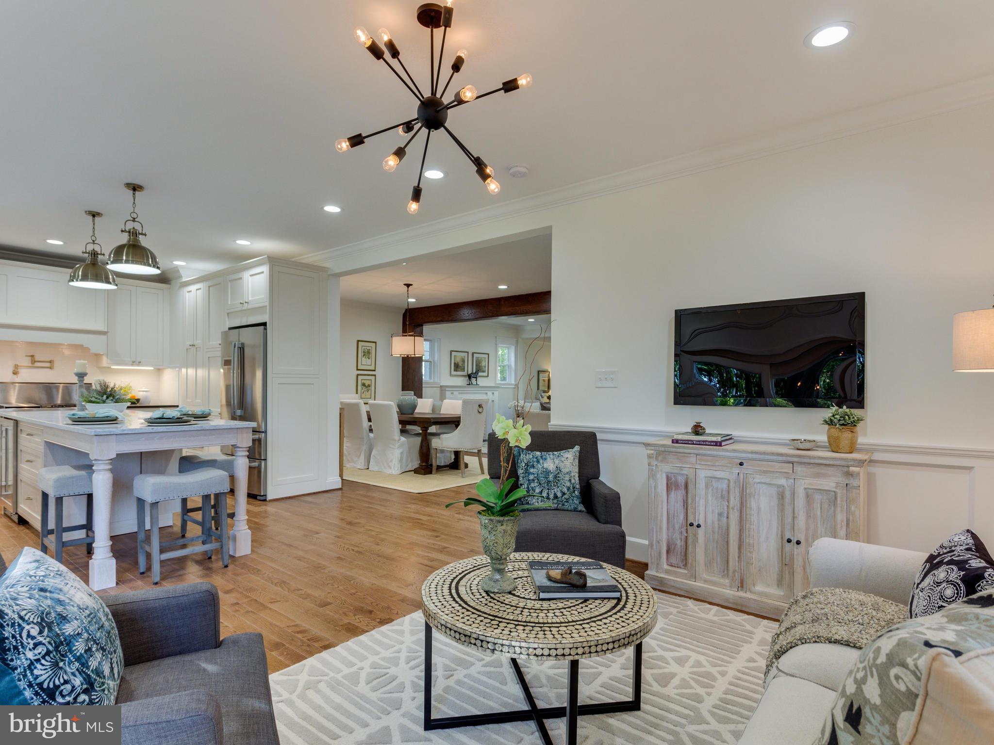 3722 Chesapeake Street Northwest Washington, DC 20016 - Photo 6 of 30 a living room with furniture and a flat screen tv