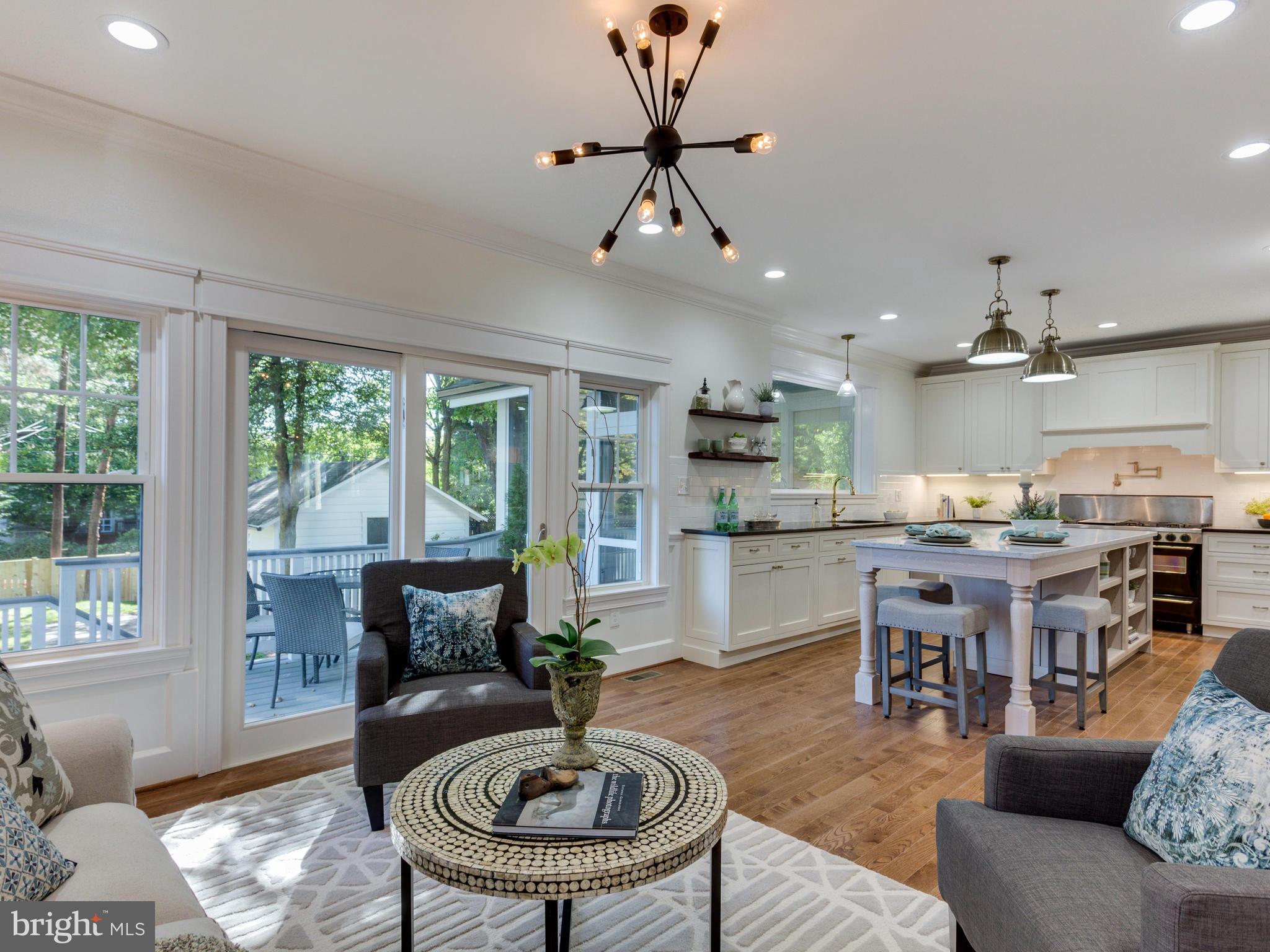 3722 Chesapeake Street Northwest Washington, DC 20016 - Photo 7 of 30 a living room with furniture and a table