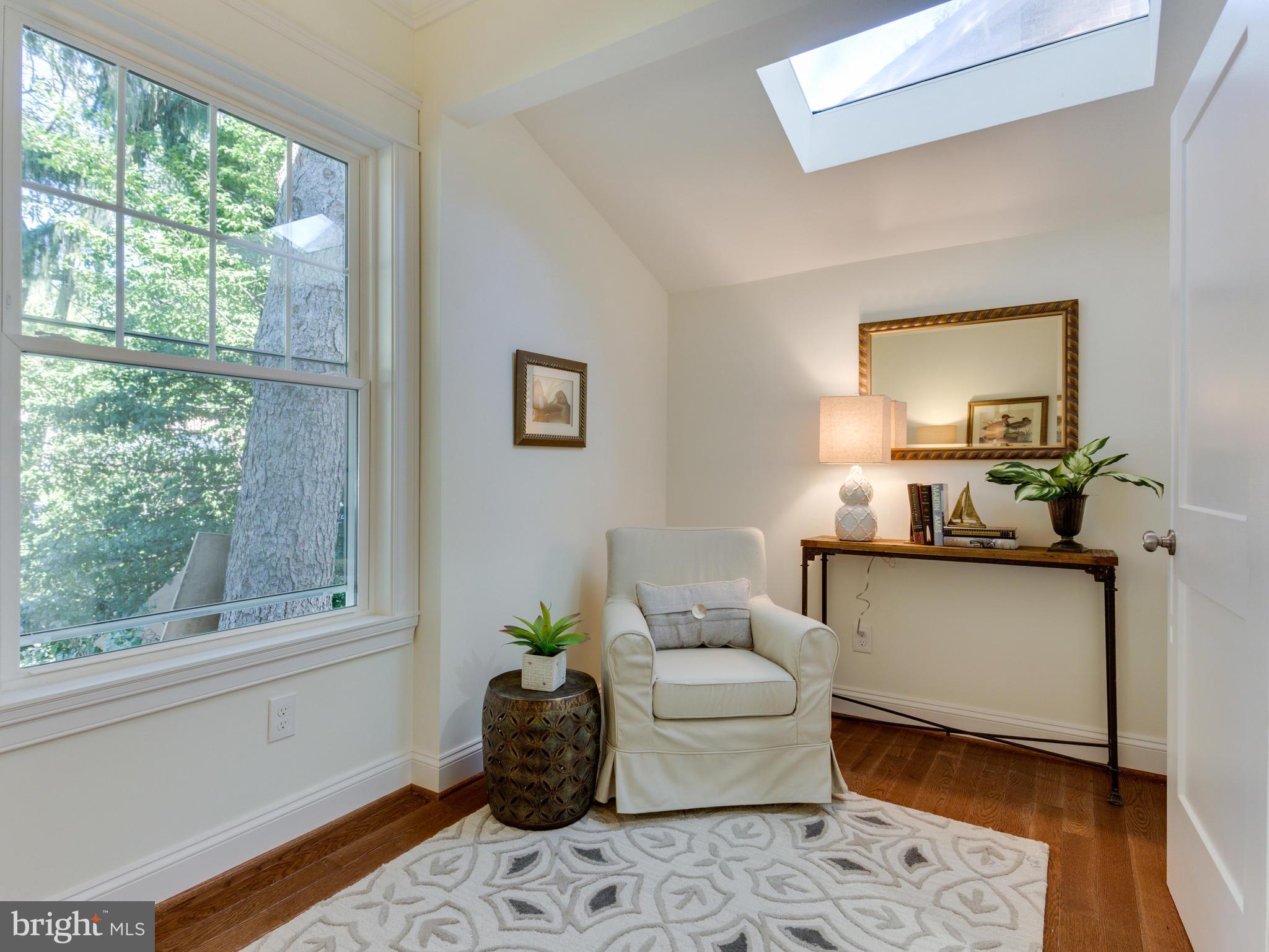 3722 Chesapeake Street Northwest Washington, DC 20016 - Photo 10 of 30 a living room with furniture and a window