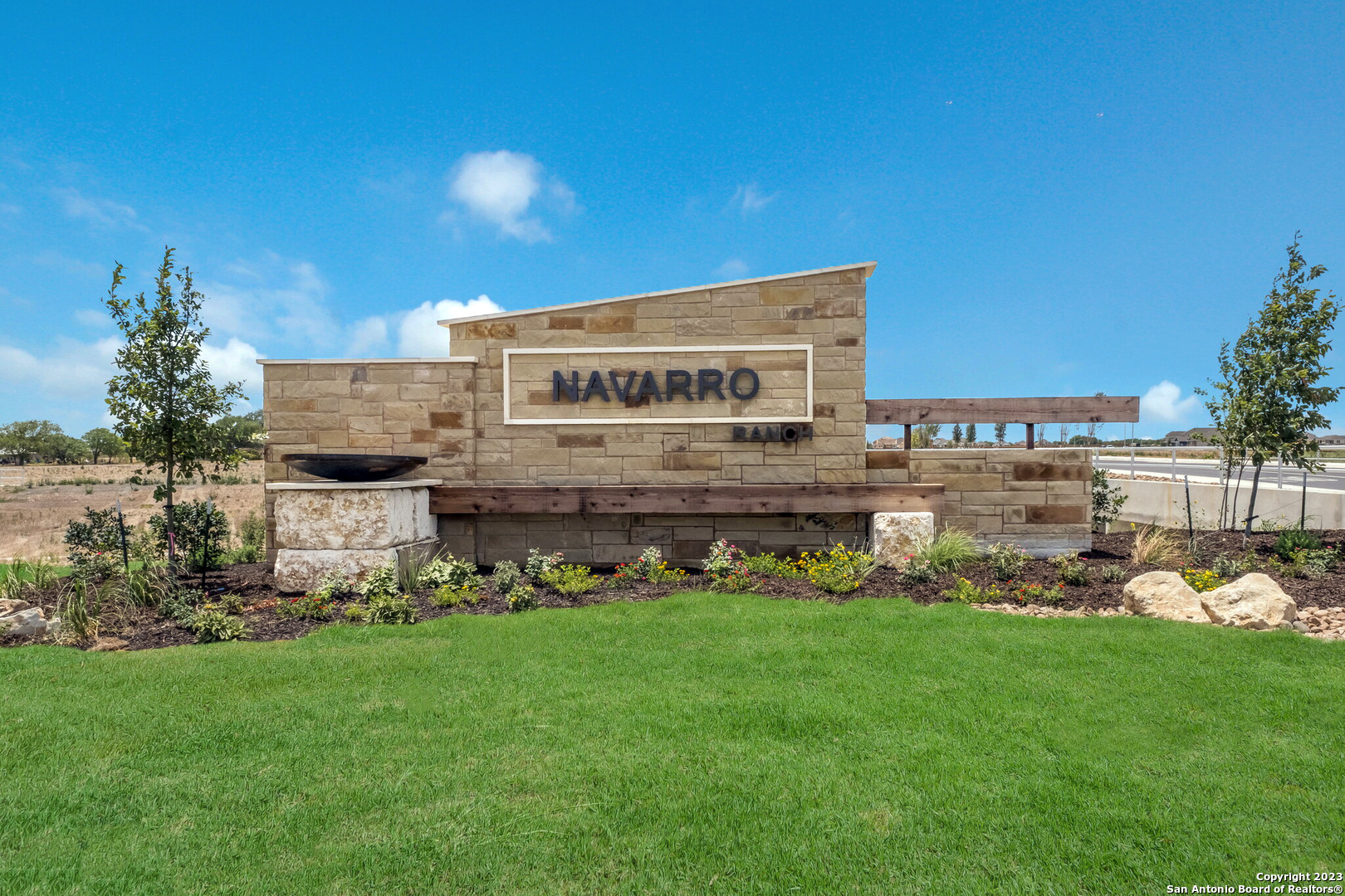 5775 Musquiz Ridge Seguin, TX 78155 - Photo 2 of 25 a view of a house with a big yard potted plants and large tree