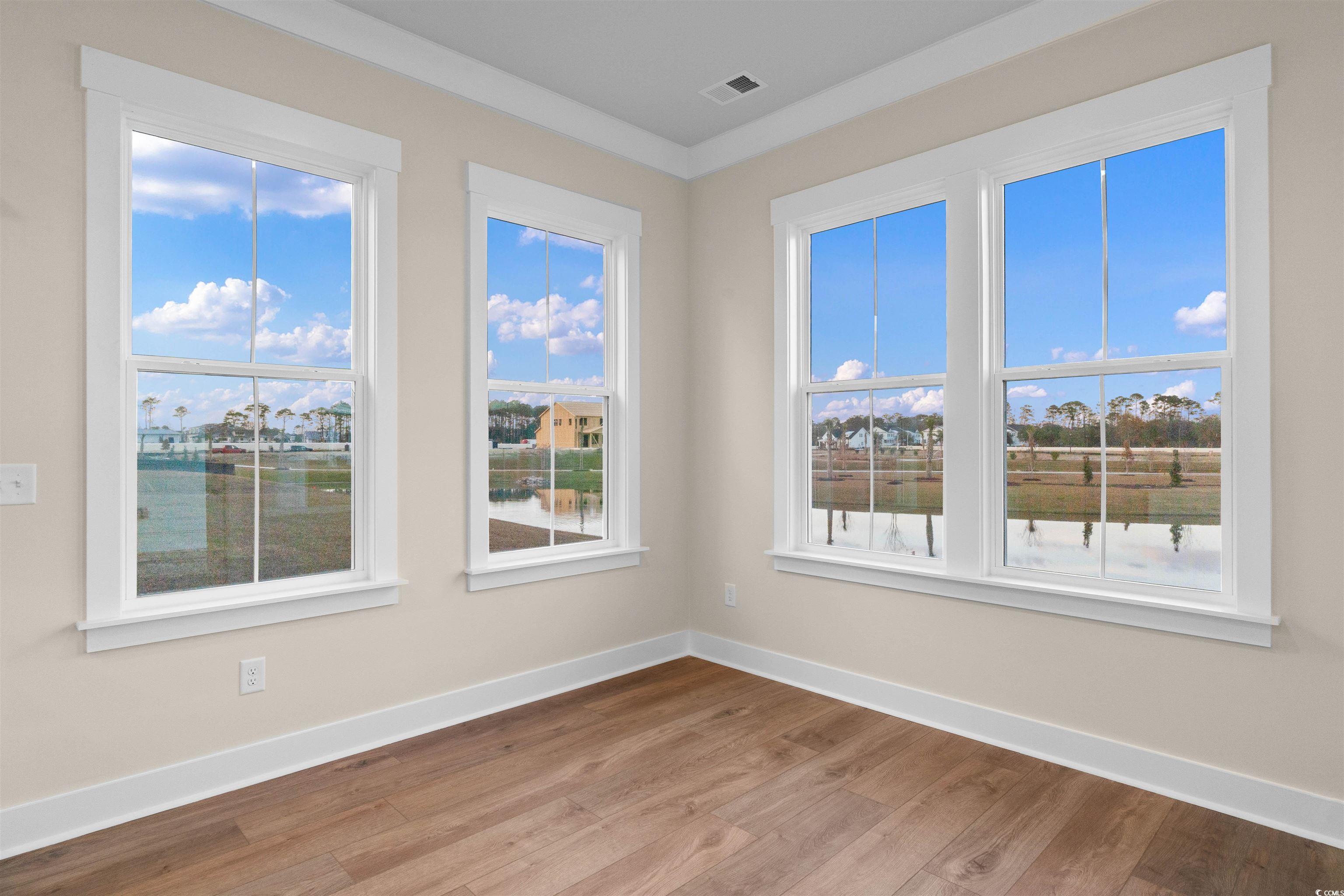 224 Atlantic Breeze Street Myrtle Beach, SC 29572 - Photo 15 of 39 Unfurnished room featuring baseboards and light wood-style flooring